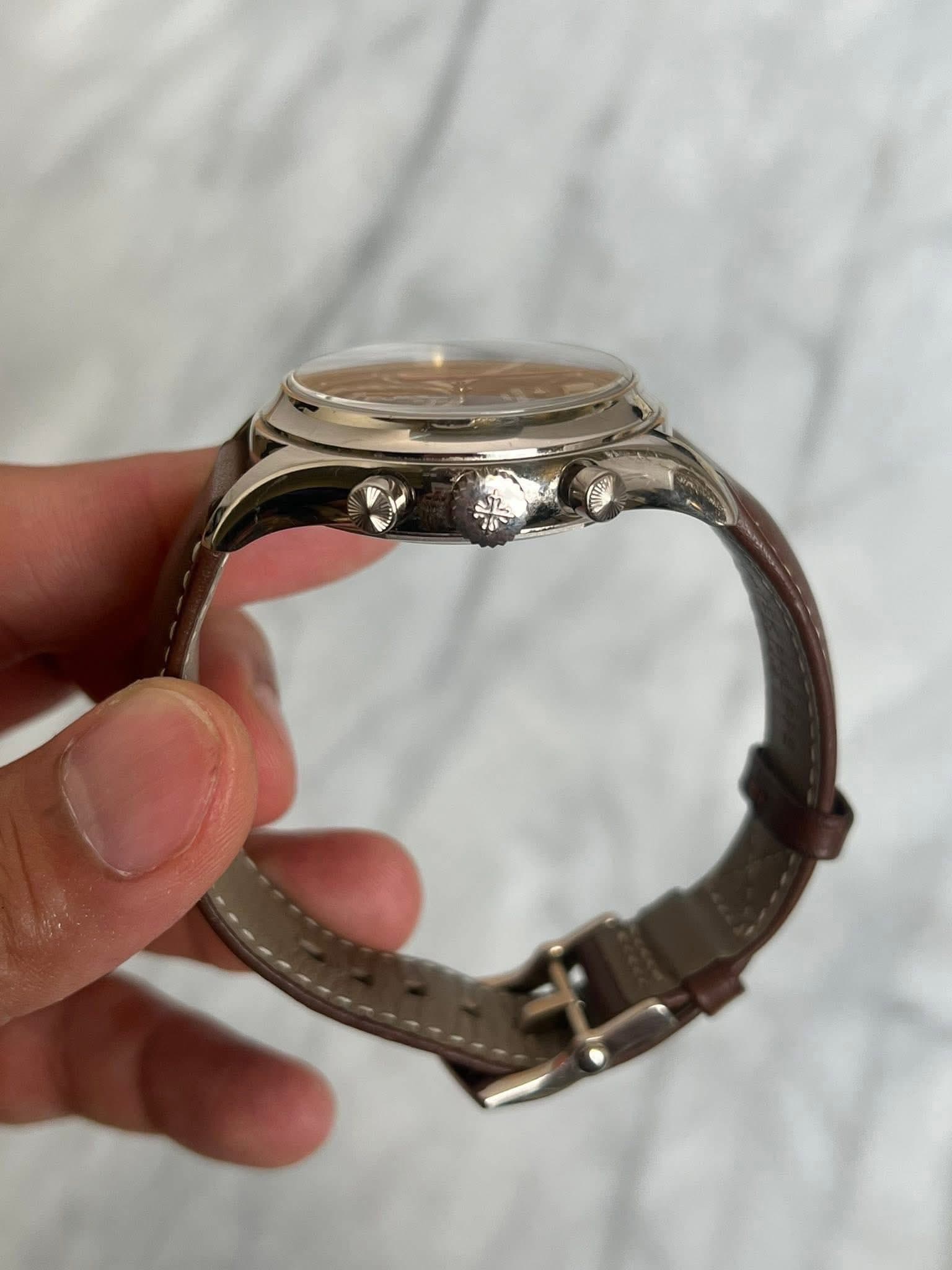 May be an image of wrist watch
