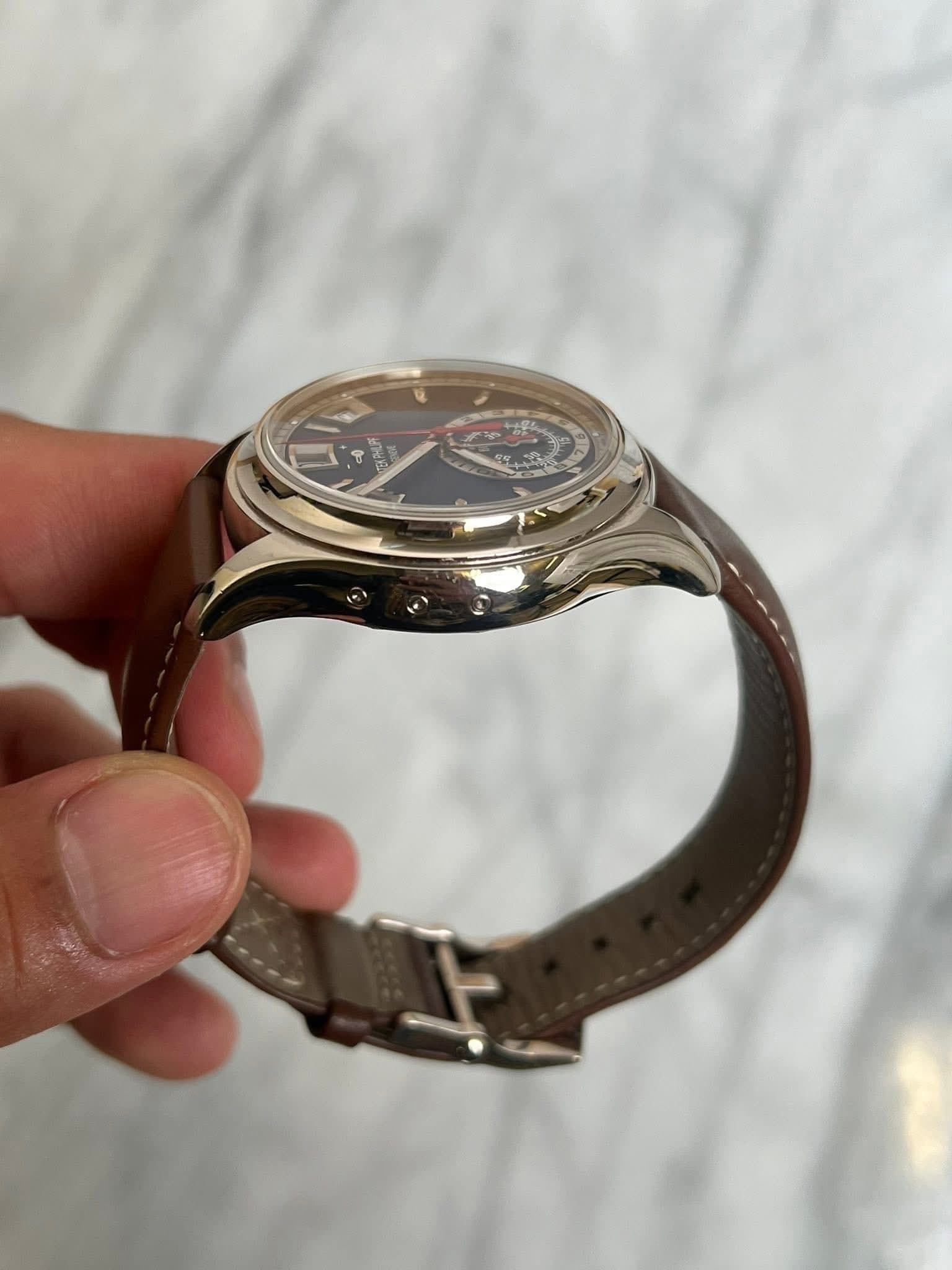 May be an image of wrist watch and text