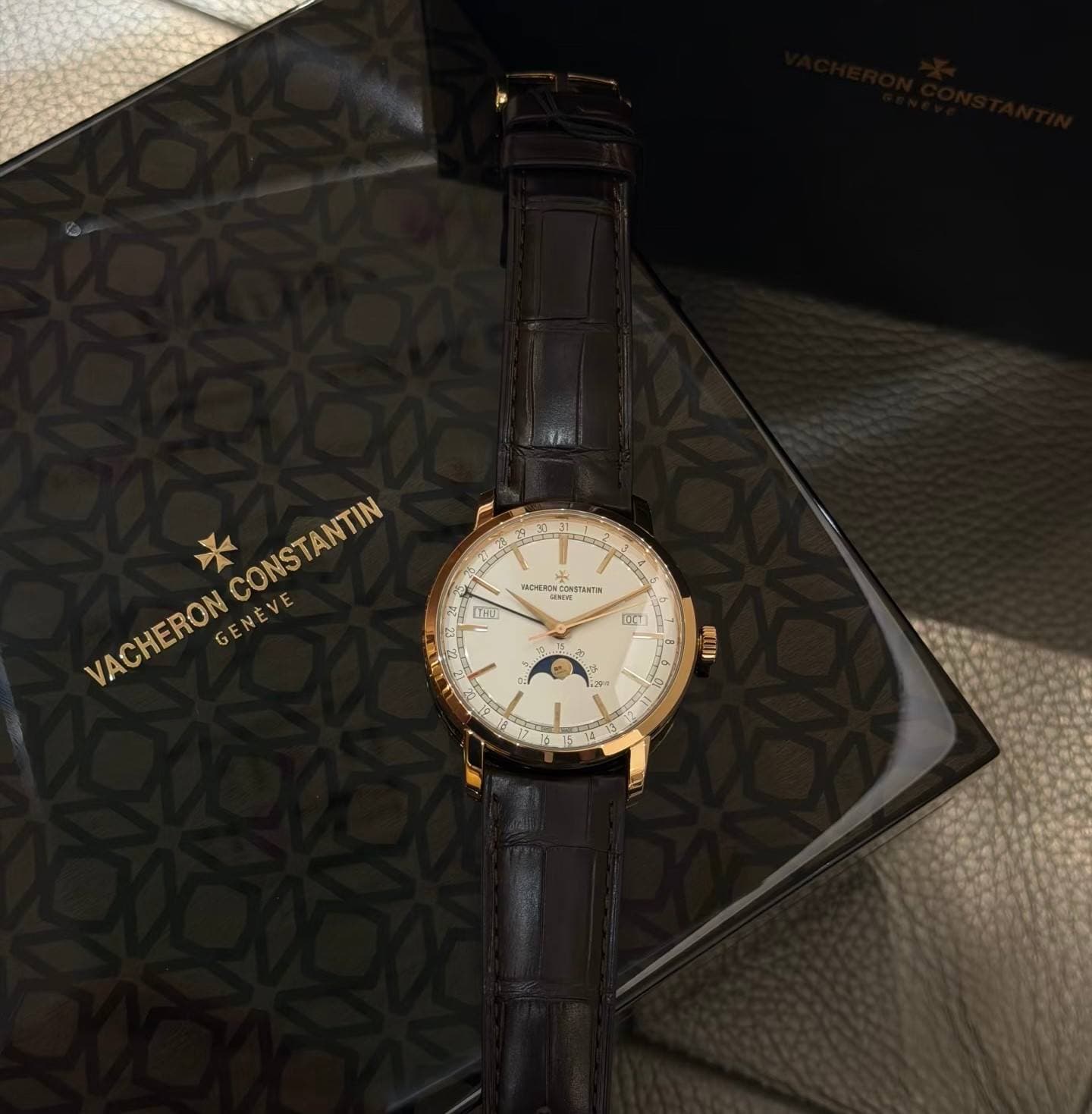 May be an image of wrist watch and text