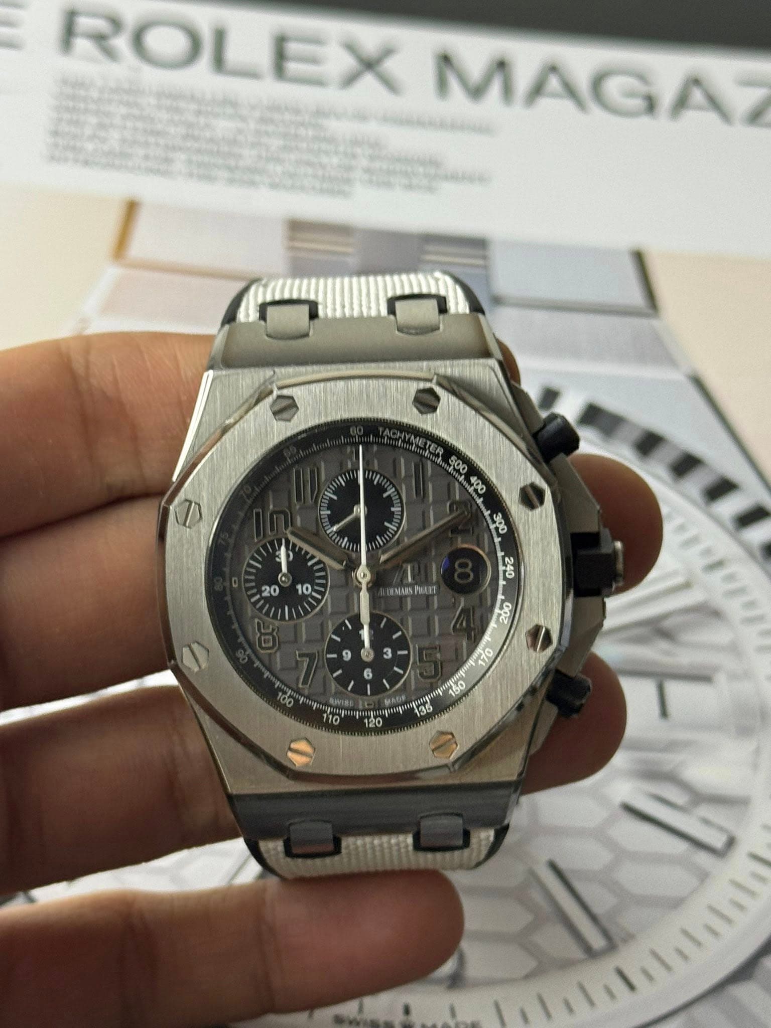 May be an image of wrist watch and text