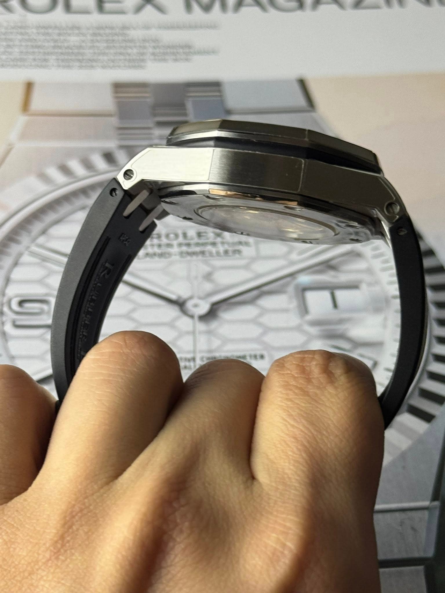May be an image of wrist watch and text that says 'ROLEX D-OWELLER'