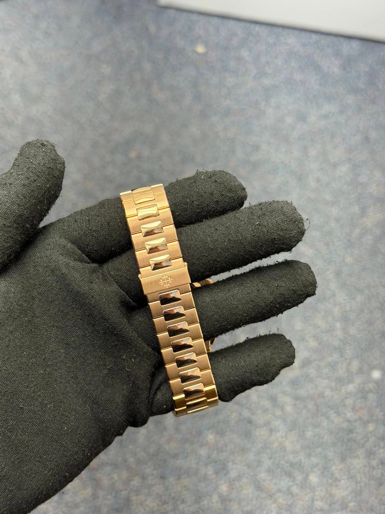 May be an image of jewelry and wrist watch