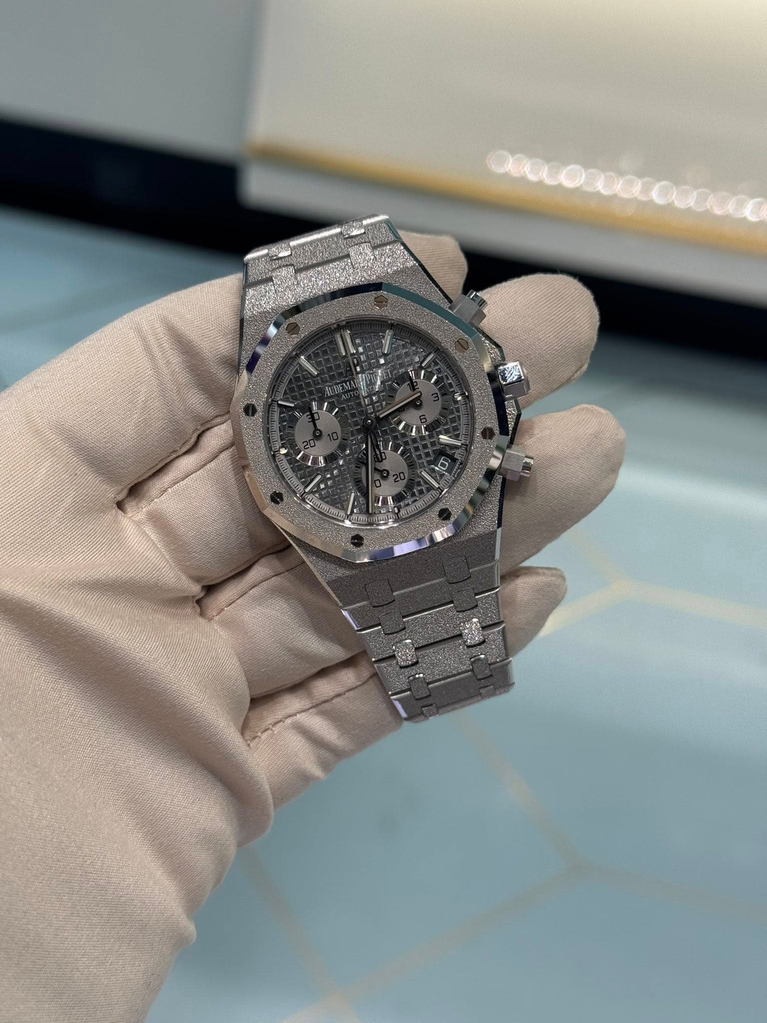 May be an image of wrist watch and text