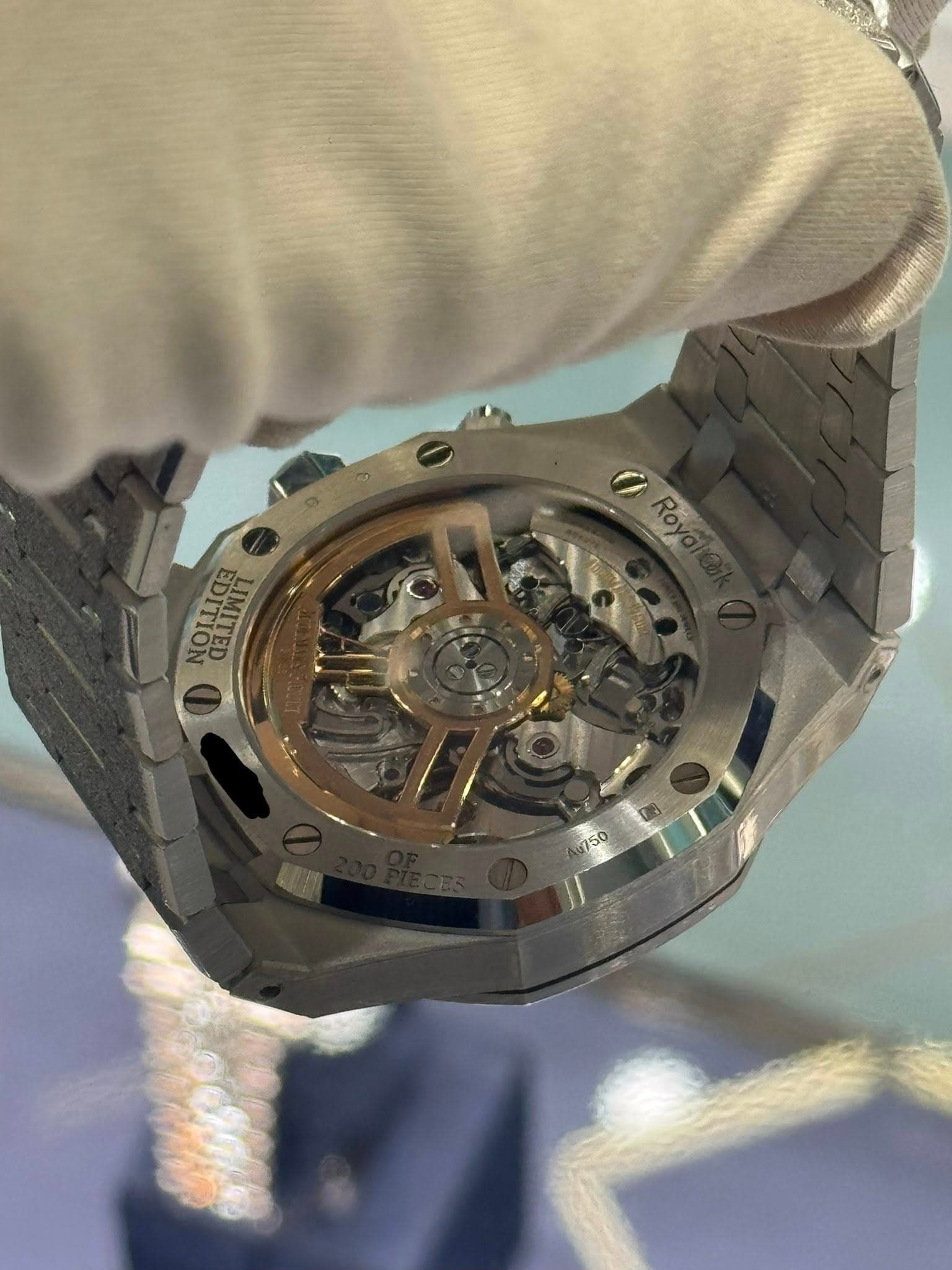 May be an image of wrist watch and text