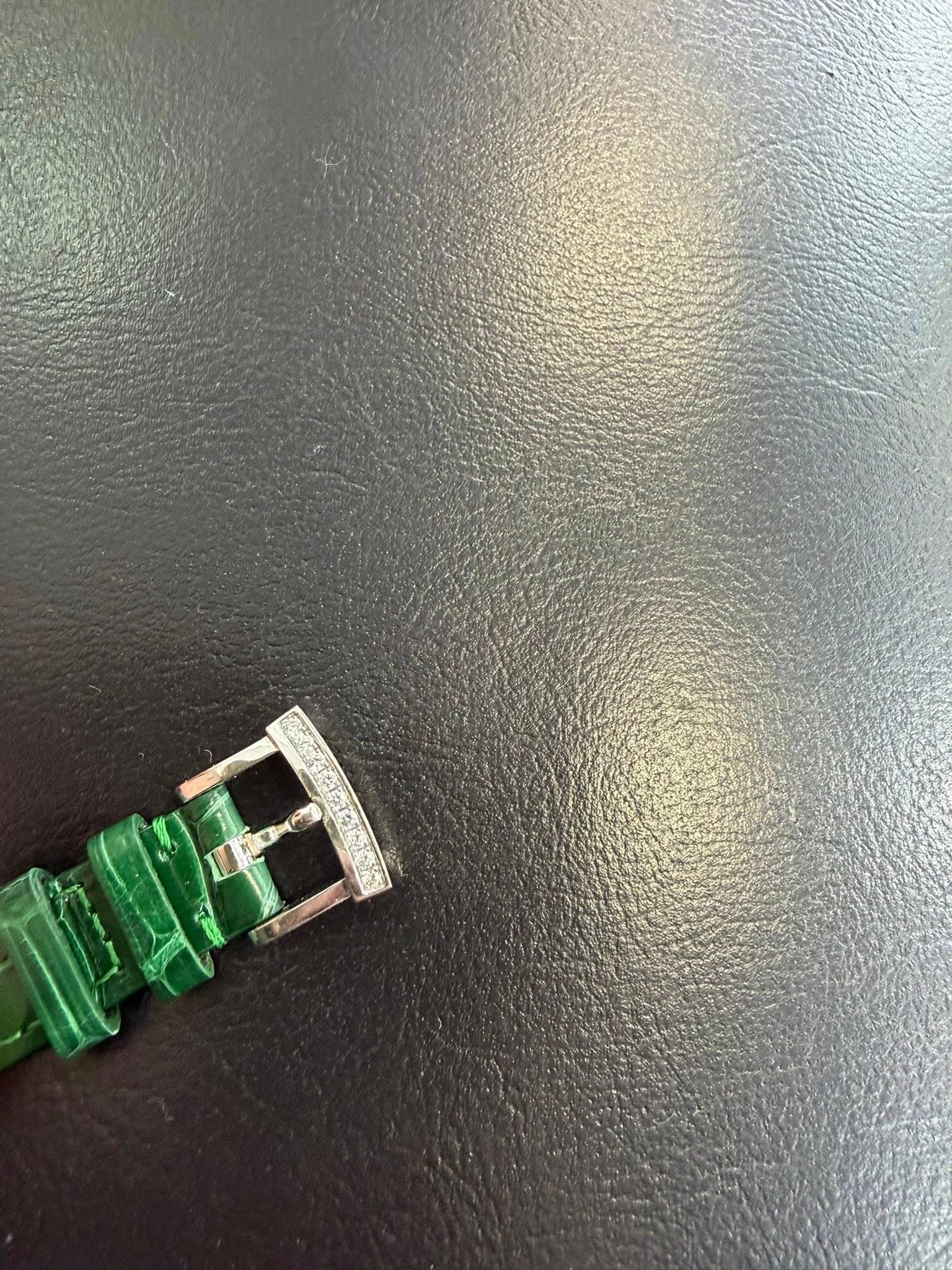 May be an image of wrist watch and ring