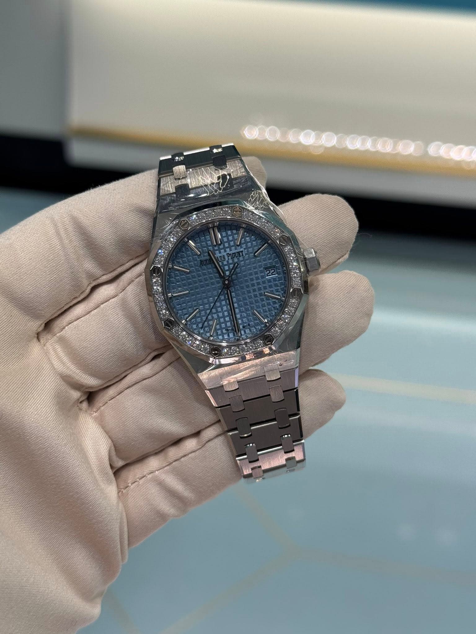 May be an image of wrist watch and text