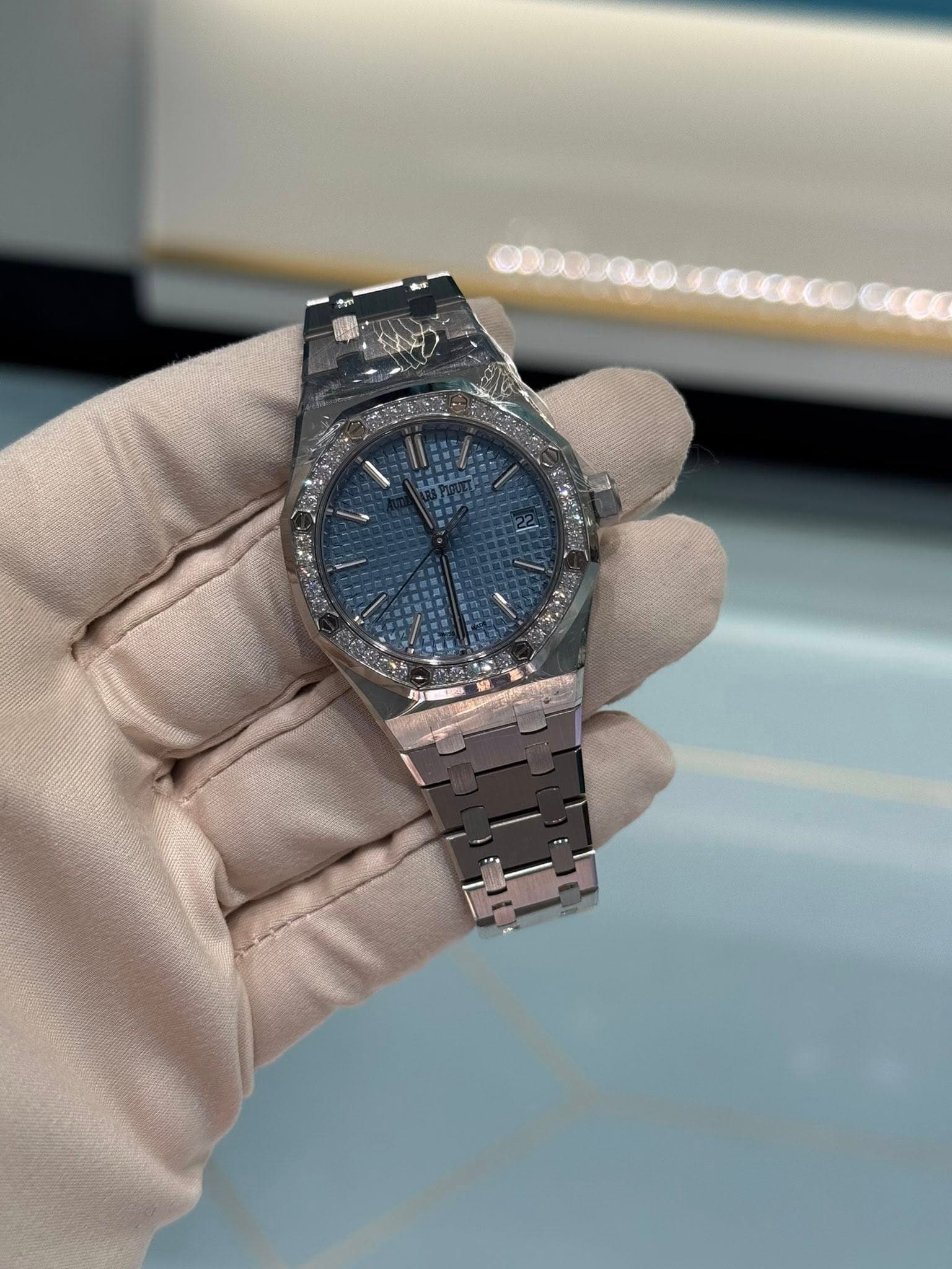 May be an image of wrist watch and text