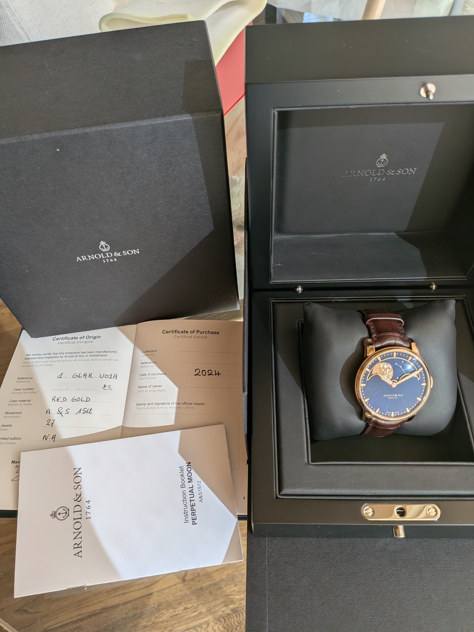May be an image of wrist watch and text