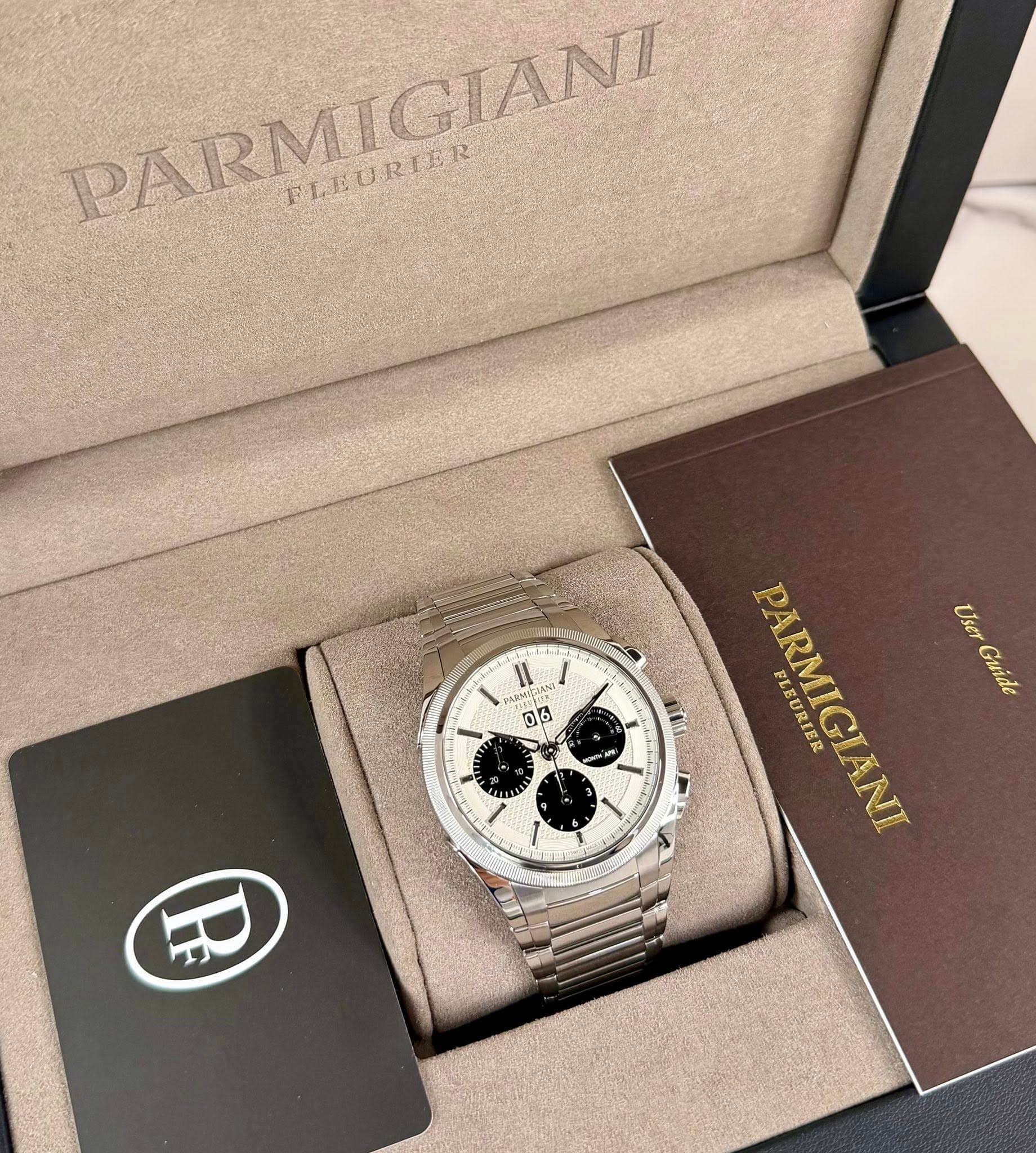 May be an image of wrist watch and text that says 'PARMIGIANI FLEURIER ANSINICION II 06 ARMIGIANI FLEURIER User Guide'