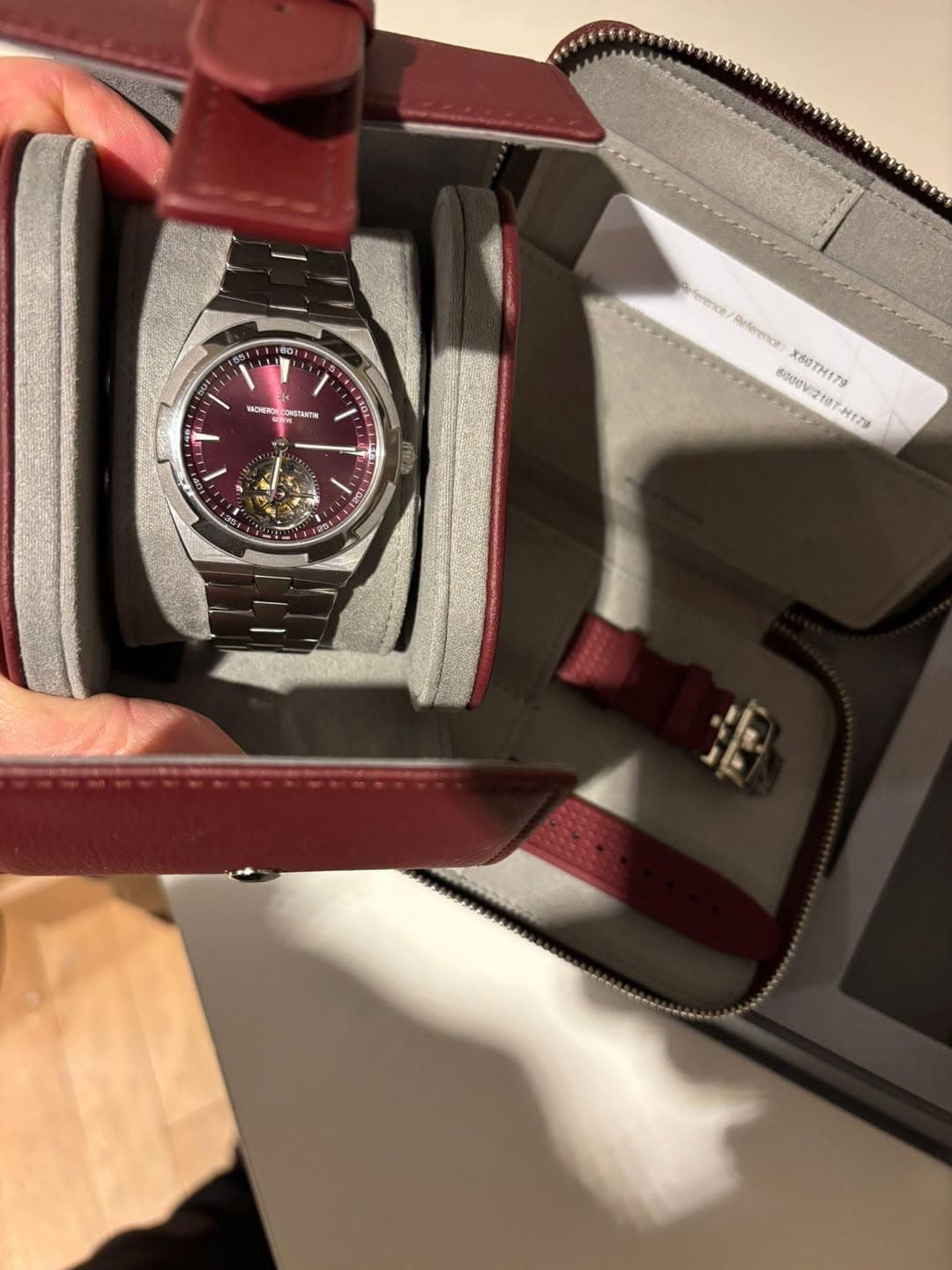 May be an image of wrist watch and text