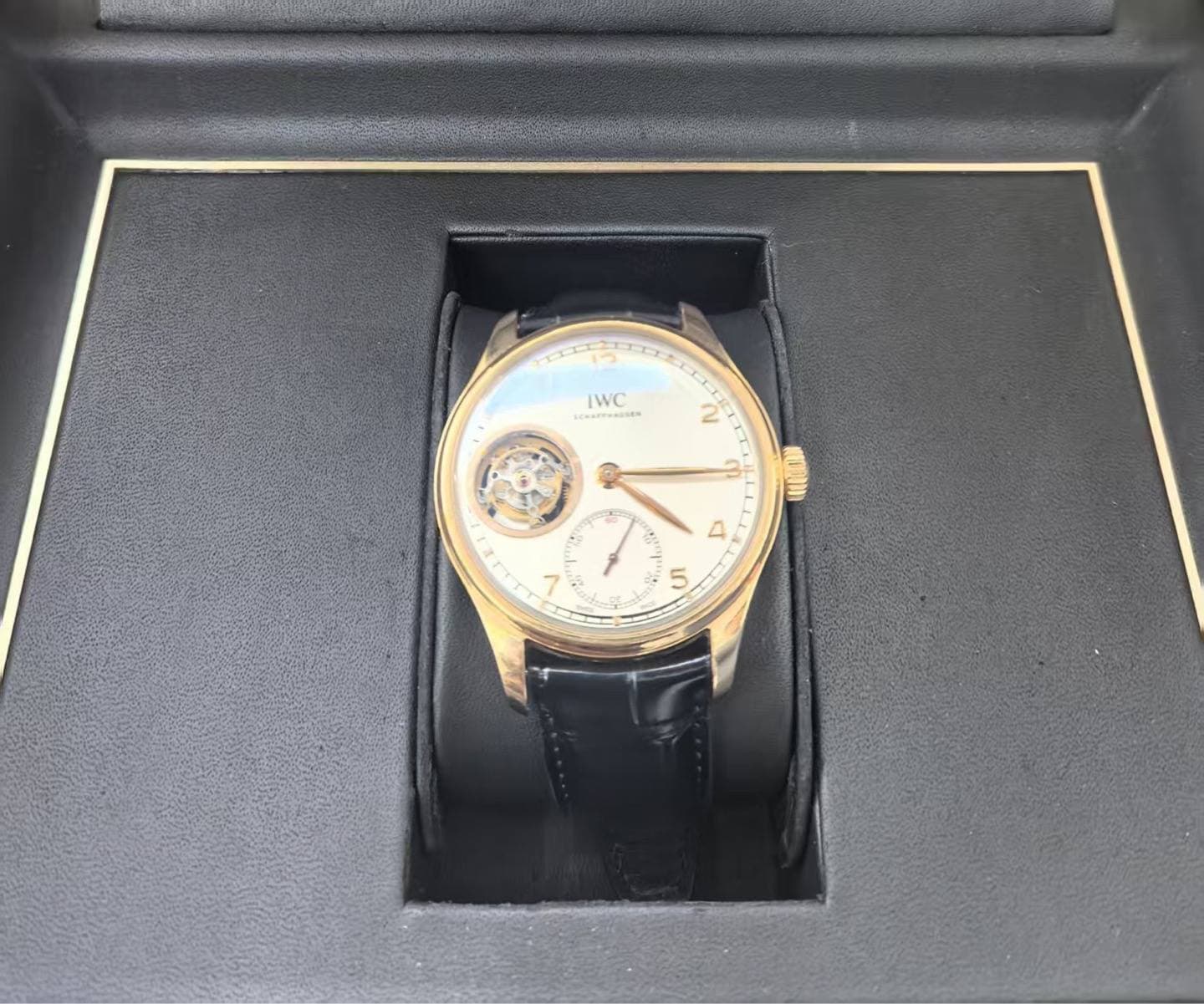 May be an image of wrist watch and text