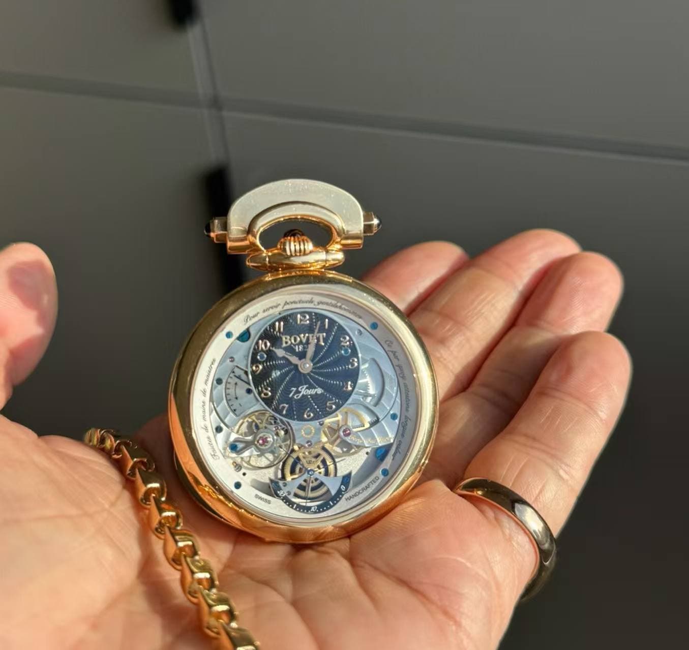 May be an image of wrist watch and text