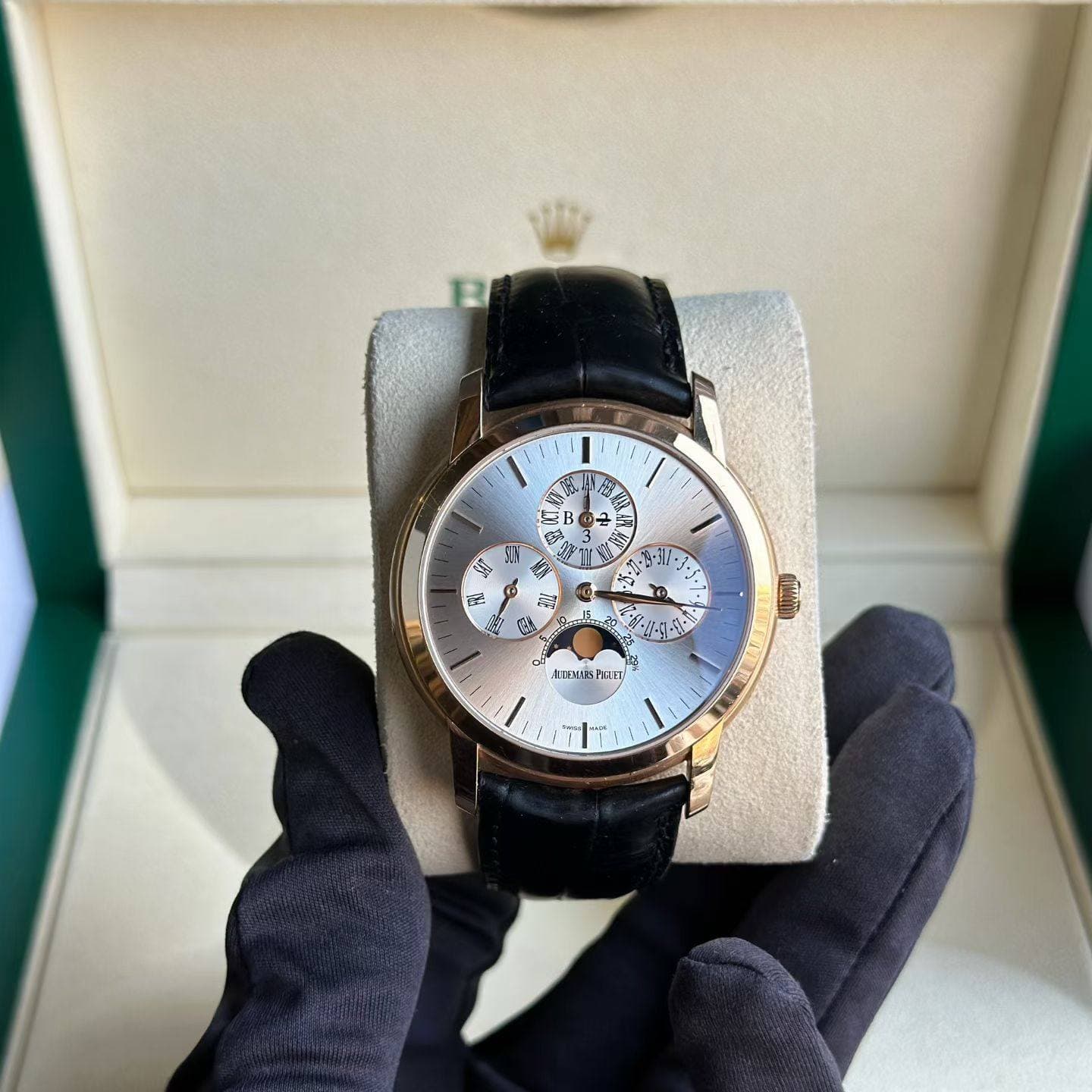 May be an image of wrist watch and text