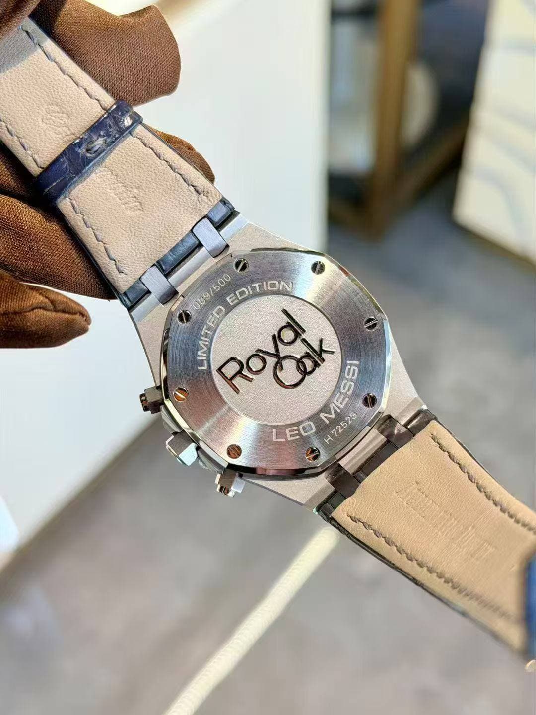 May be an image of wrist watch and text