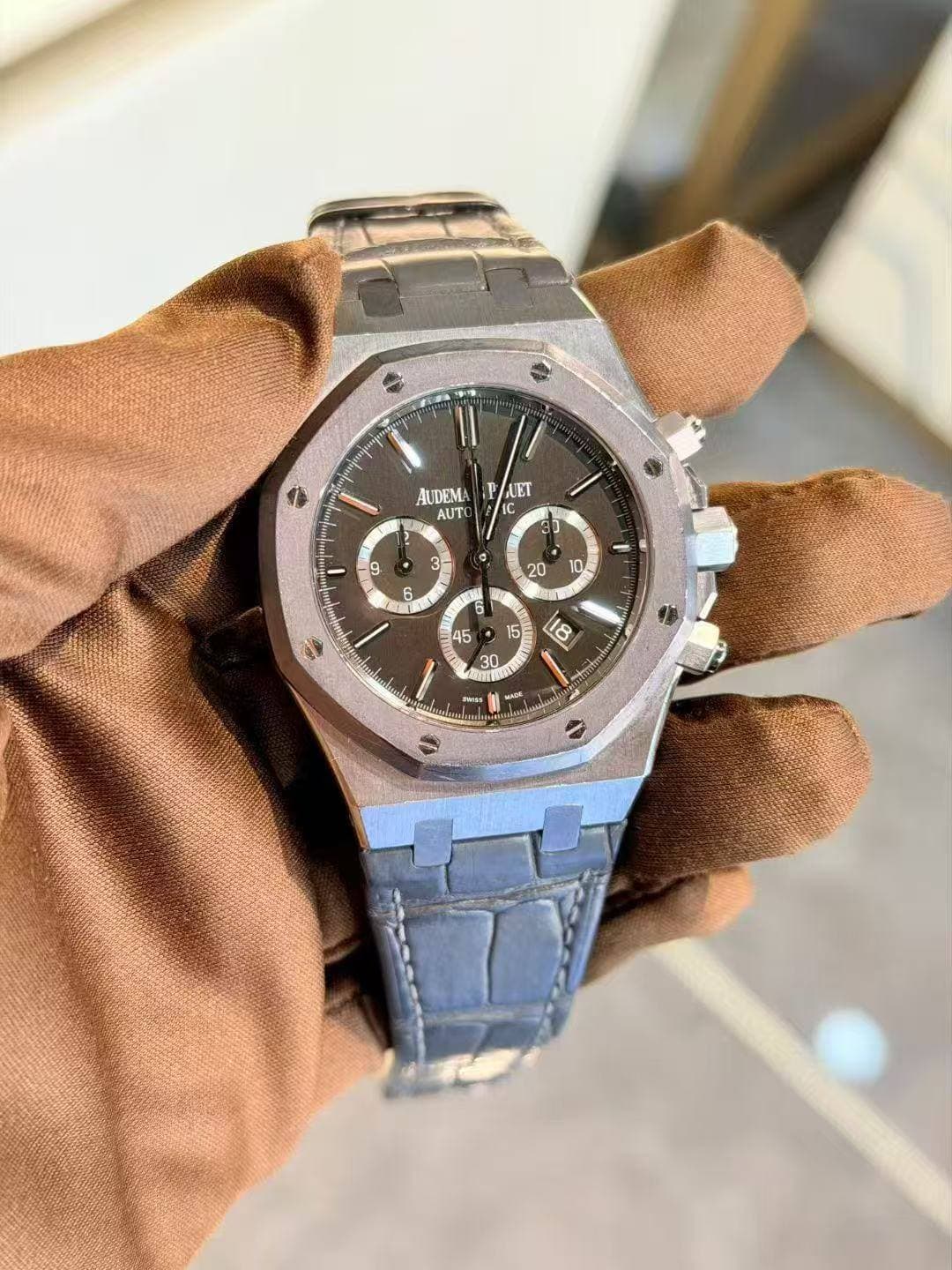 May be an image of wrist watch and text