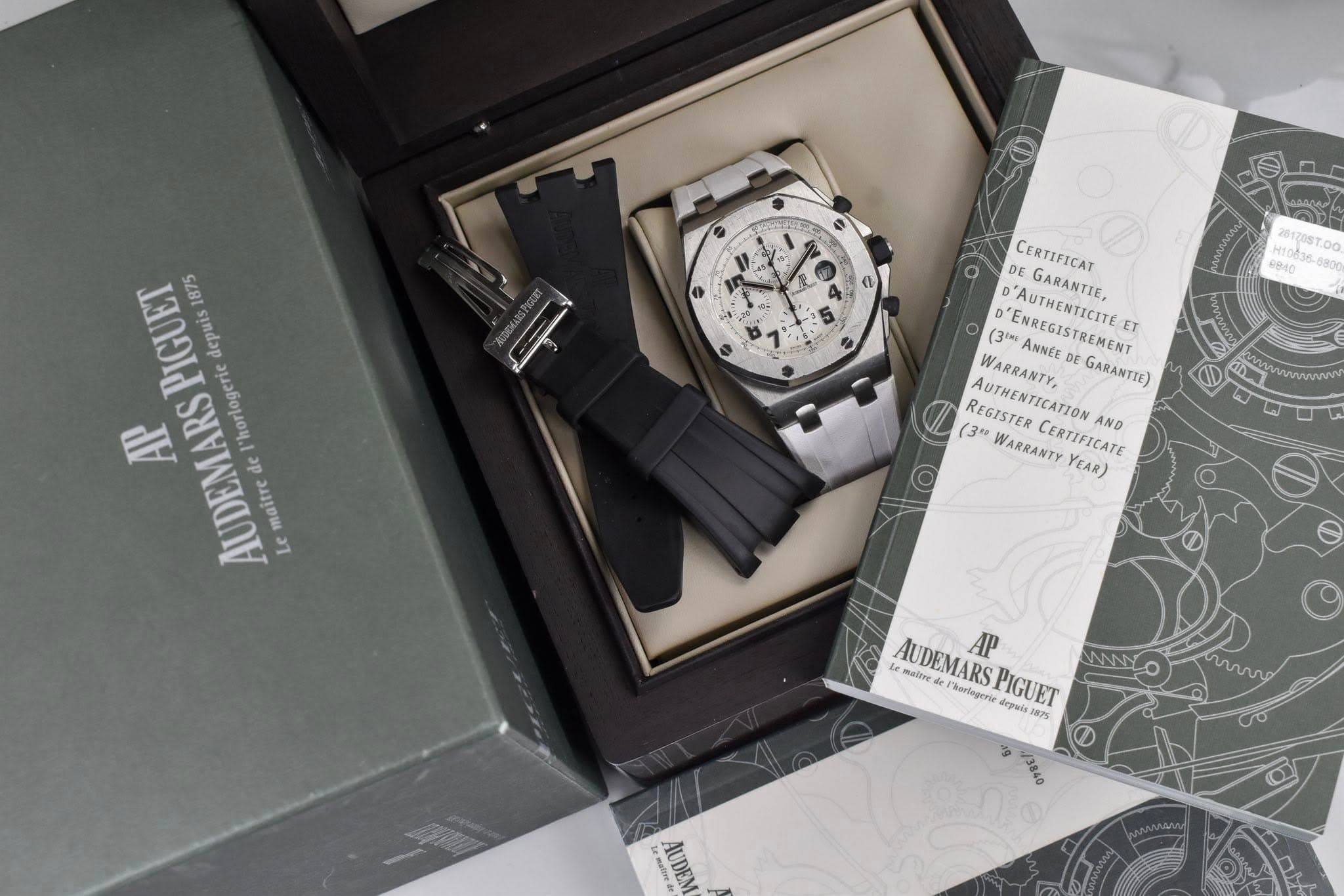 May be an image of wrist watch and text that says '/ PIGUET 1875 depuis AP ARS AUDEMARS el de "horlogerie maitre Le DE GARANTIE, CERTIFICAT D'ENREGISTREMENT ET AUTHENTICITE (3…
