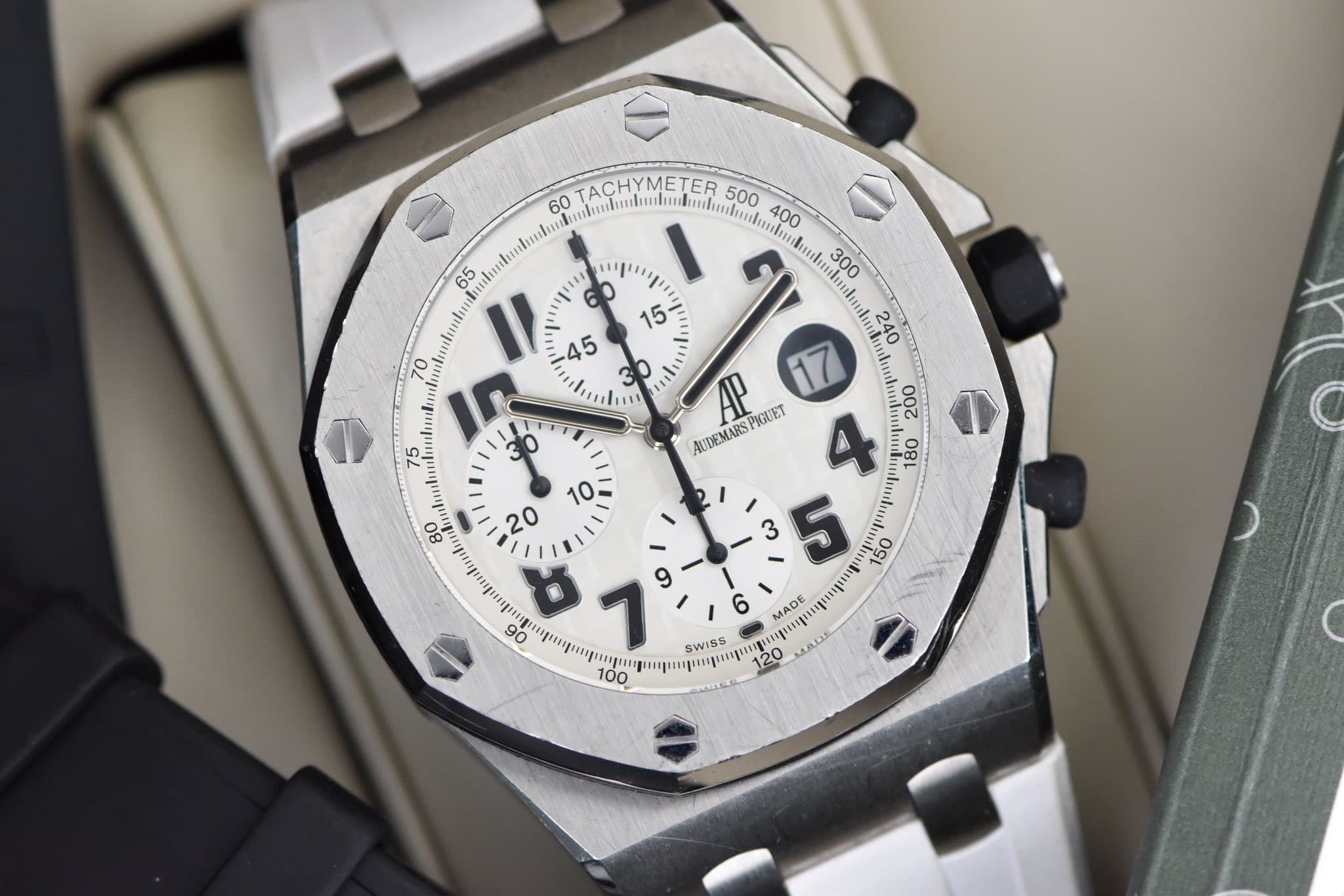 May be an image of wrist watch and text
