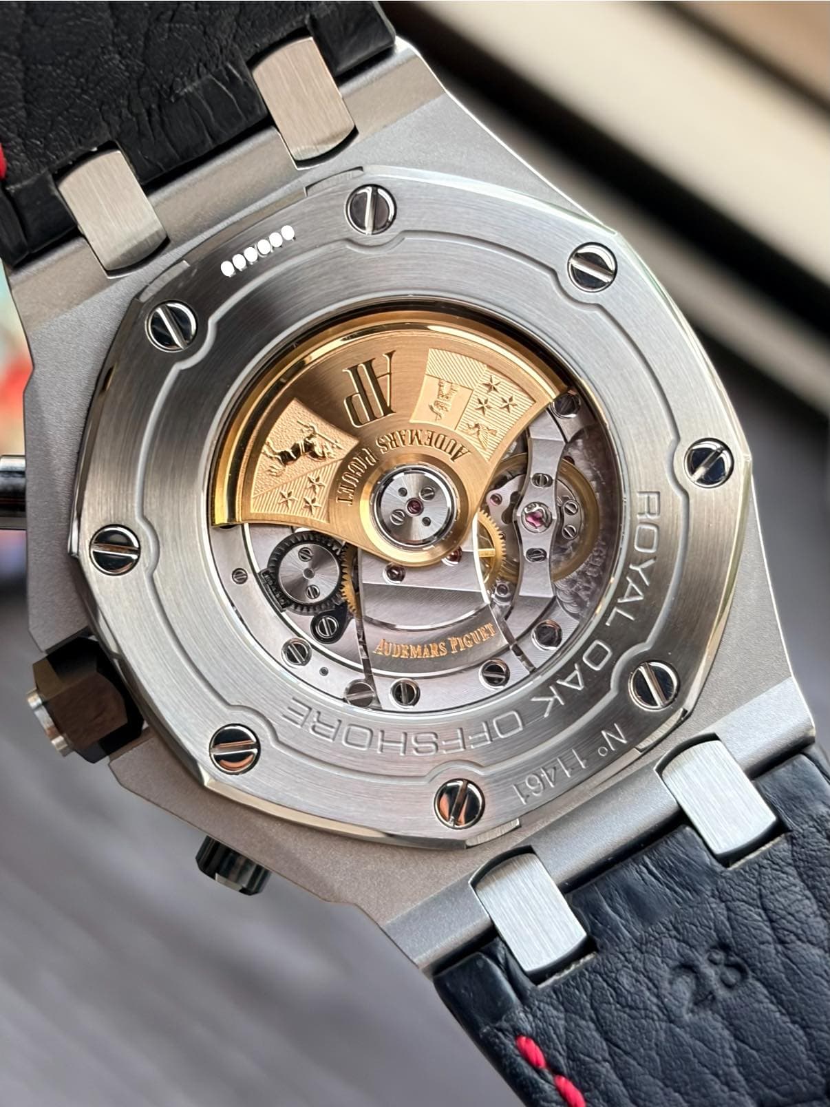 May be an image of wrist watch and text