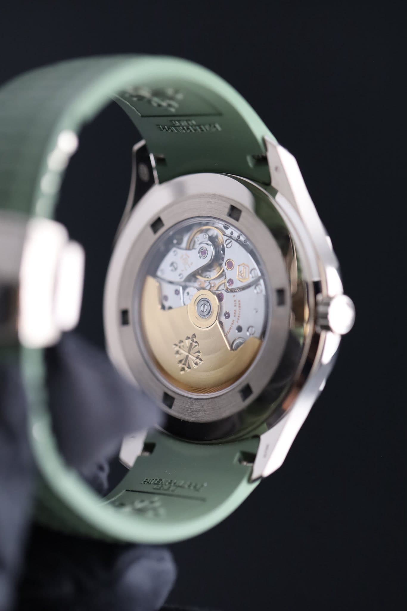 May be an image of wrist watch and text