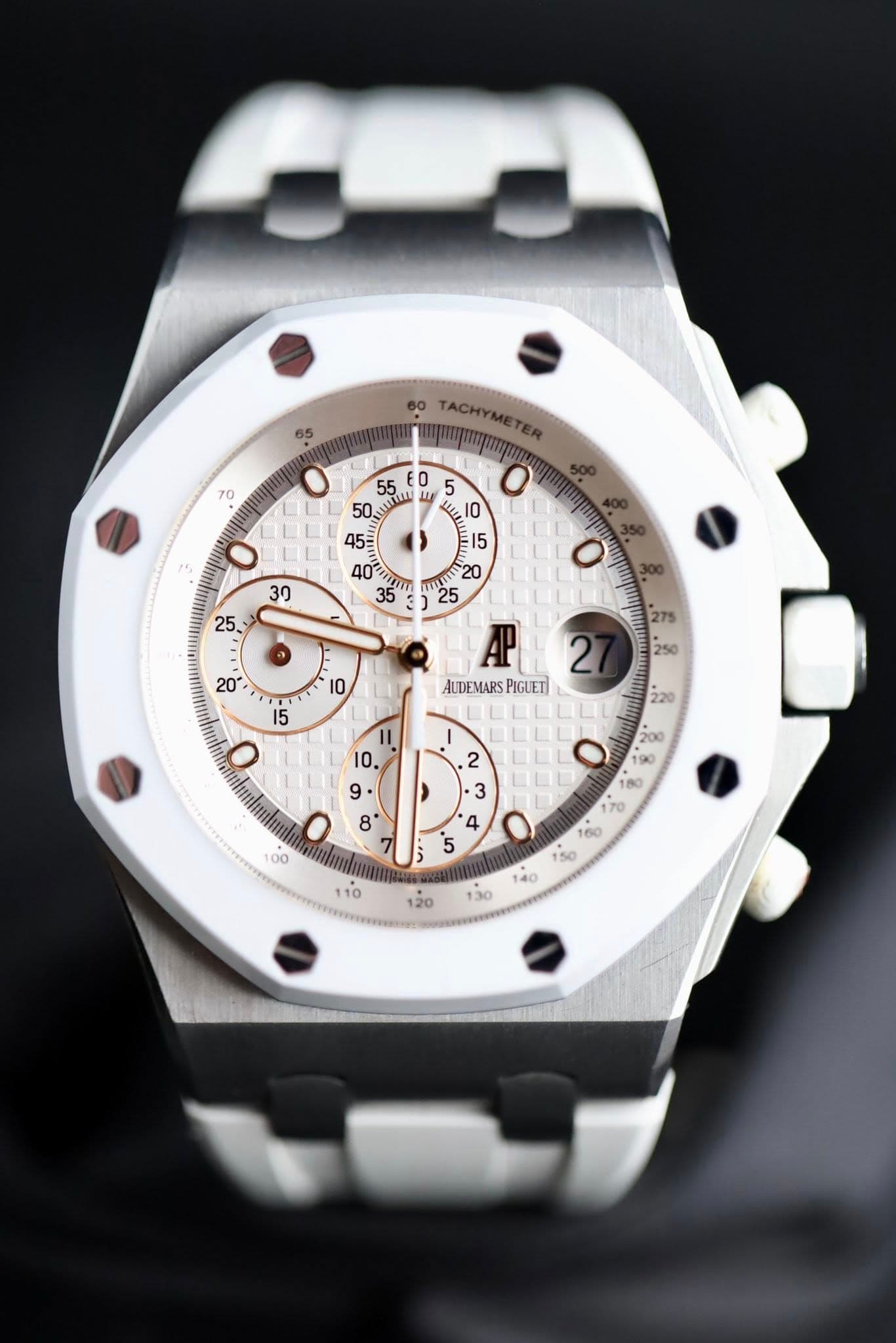 May be an image of wrist watch and text that says '65 70 60 TACHYMETER pEWT O O AUDEMARS PIGUETI I5 ٥ II ' '