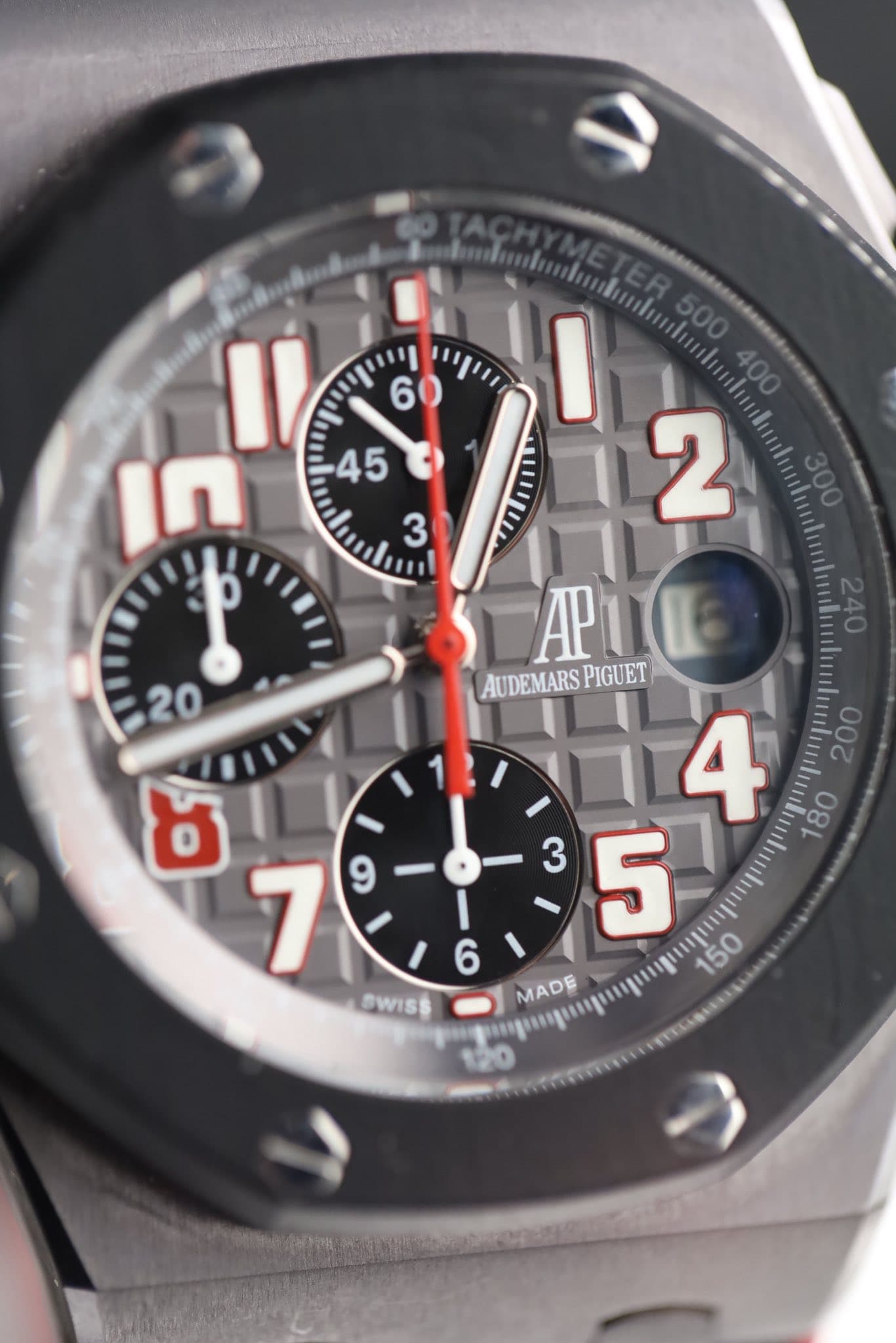 May be an image of wrist watch and text that says '6 I חן 45 I APul A AUDEMARSPIGUET AUDEMARS PIGUET H4 MADE លខ្លស្ទល 120 ២ 7 9 SWISS 6'