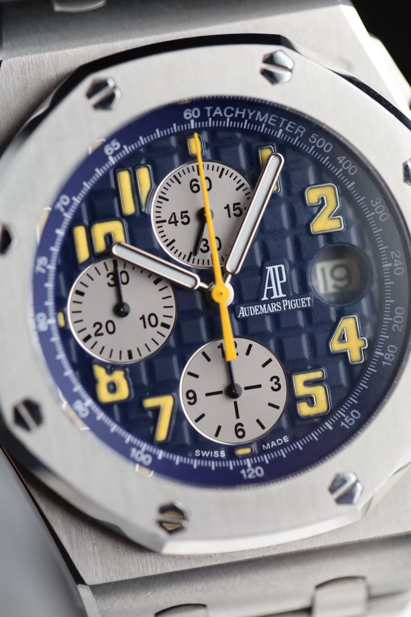 May be an image of wrist watch and text