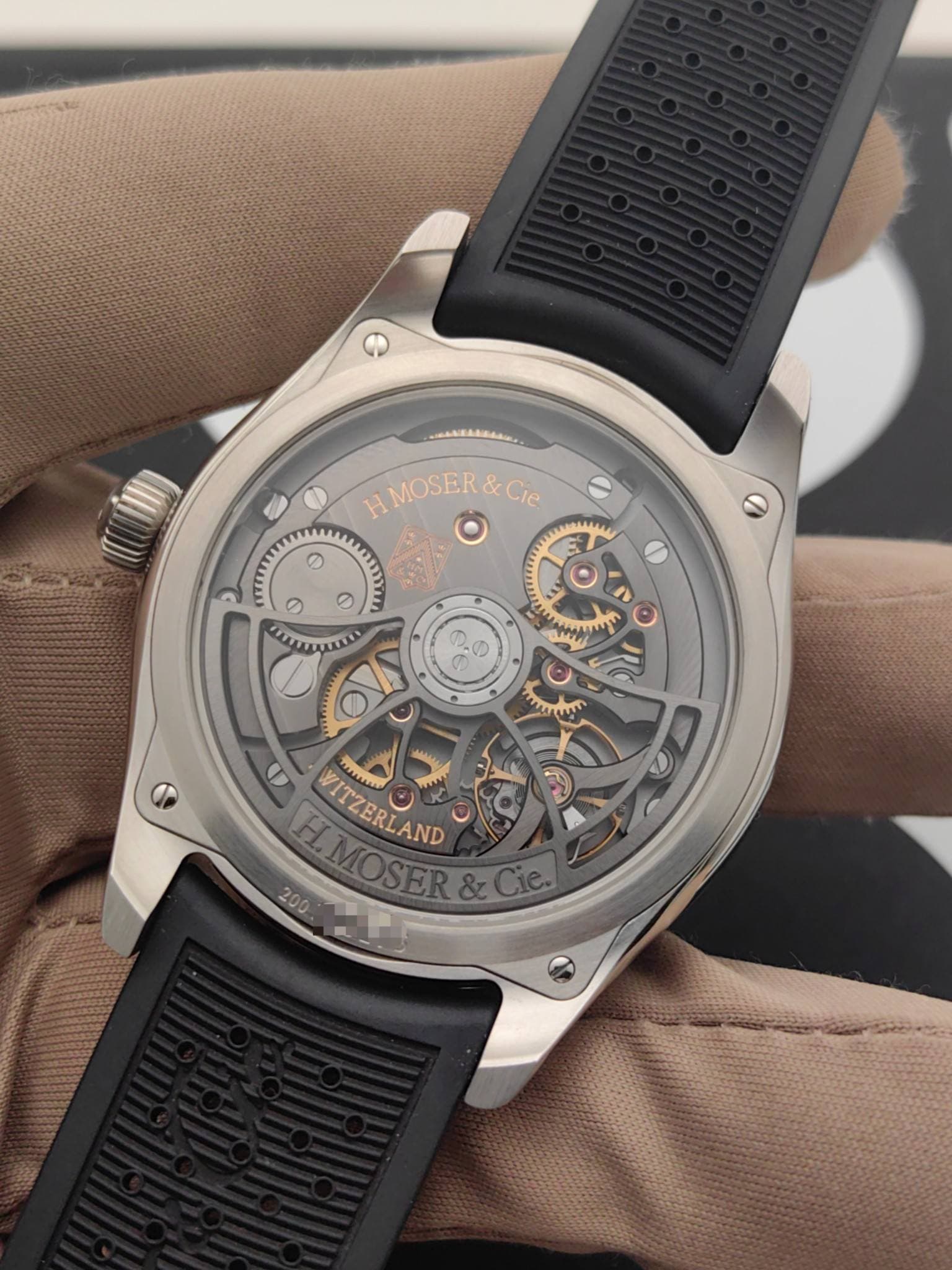 May be an image of wrist watch and text