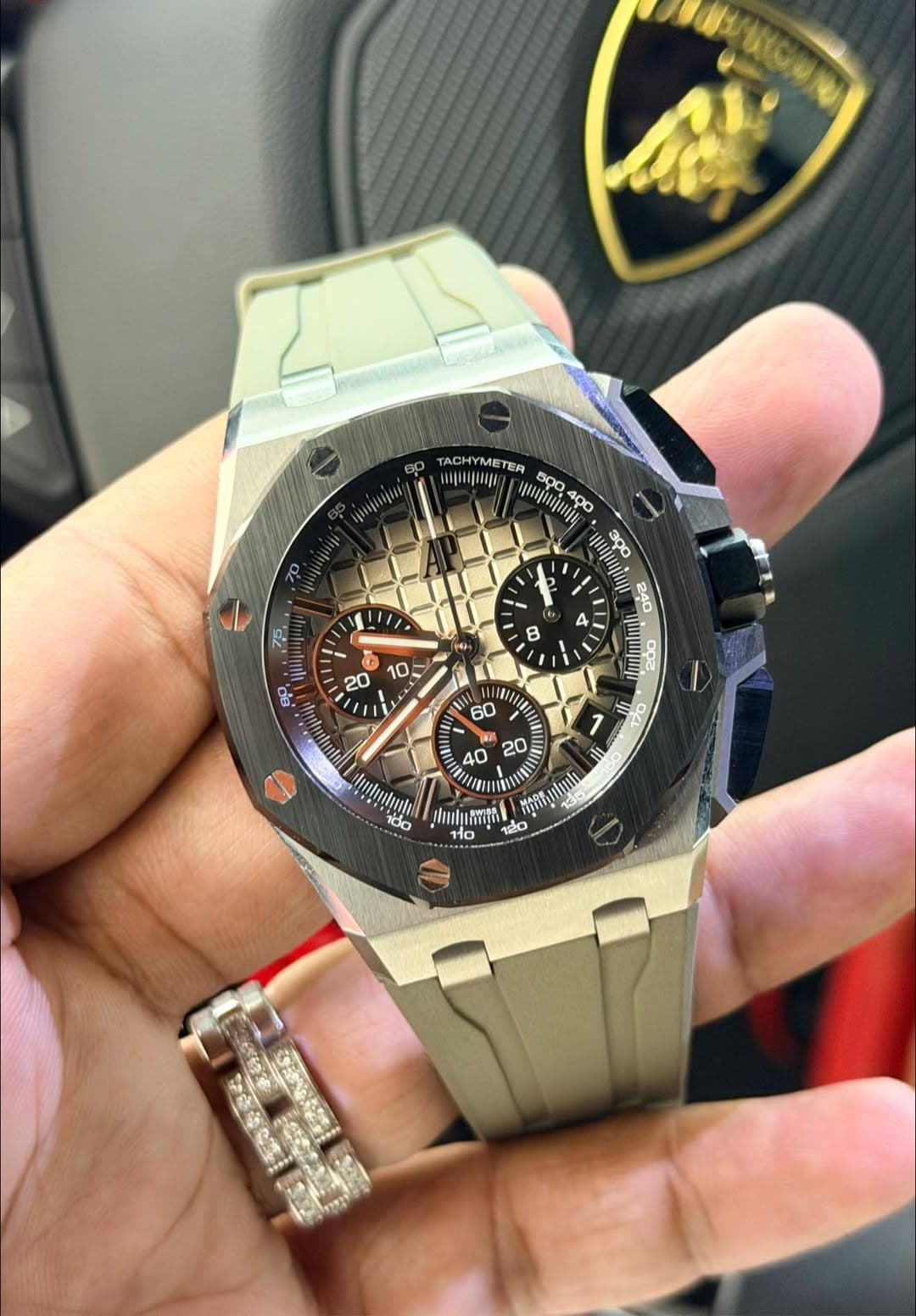 May be an image of wrist watch and text