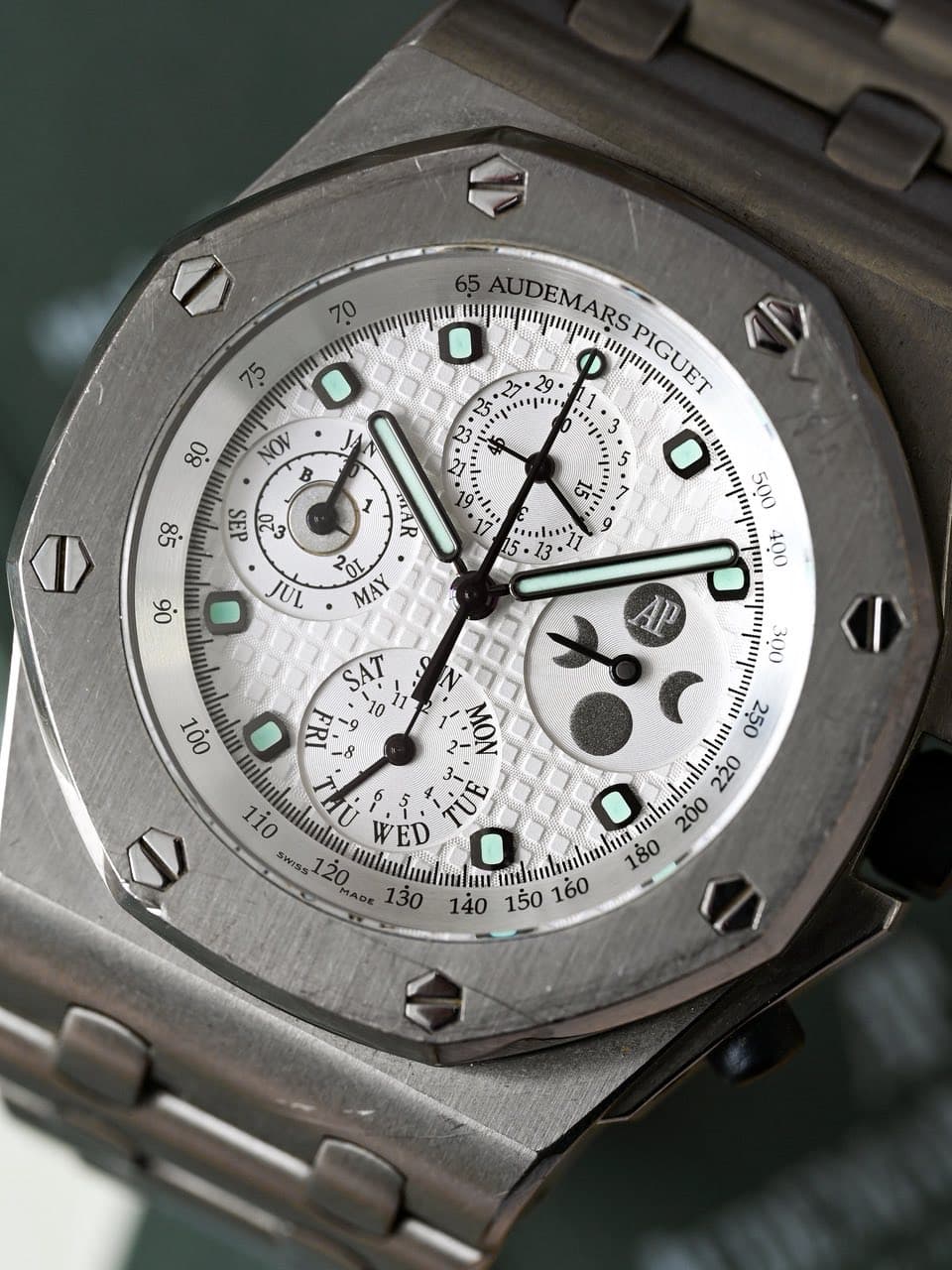 May be an image of wrist watch and text