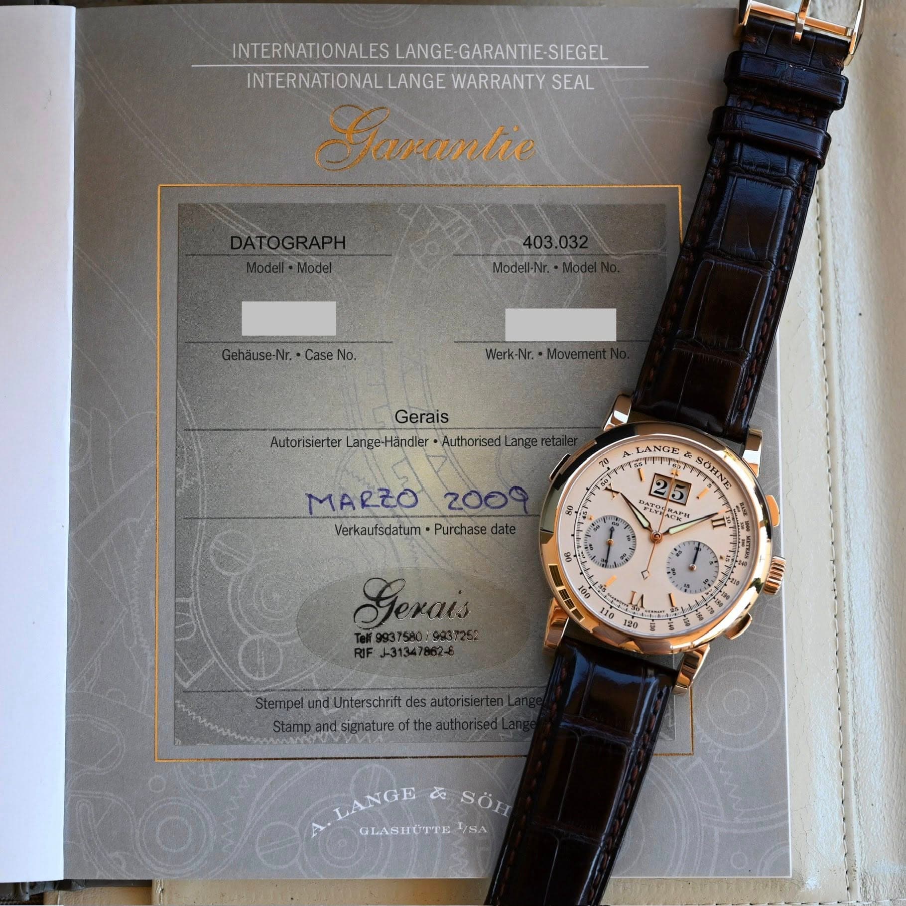 May be an image of wrist watch and text that says 'INTERNATIONALES LANGE-GARANTIE-SIEGEL INTERNATIONALESLANGE-GARANTESIEGE SIEGEL INTERNATIONAL LANGE WARRANTY SEAL Garantie…