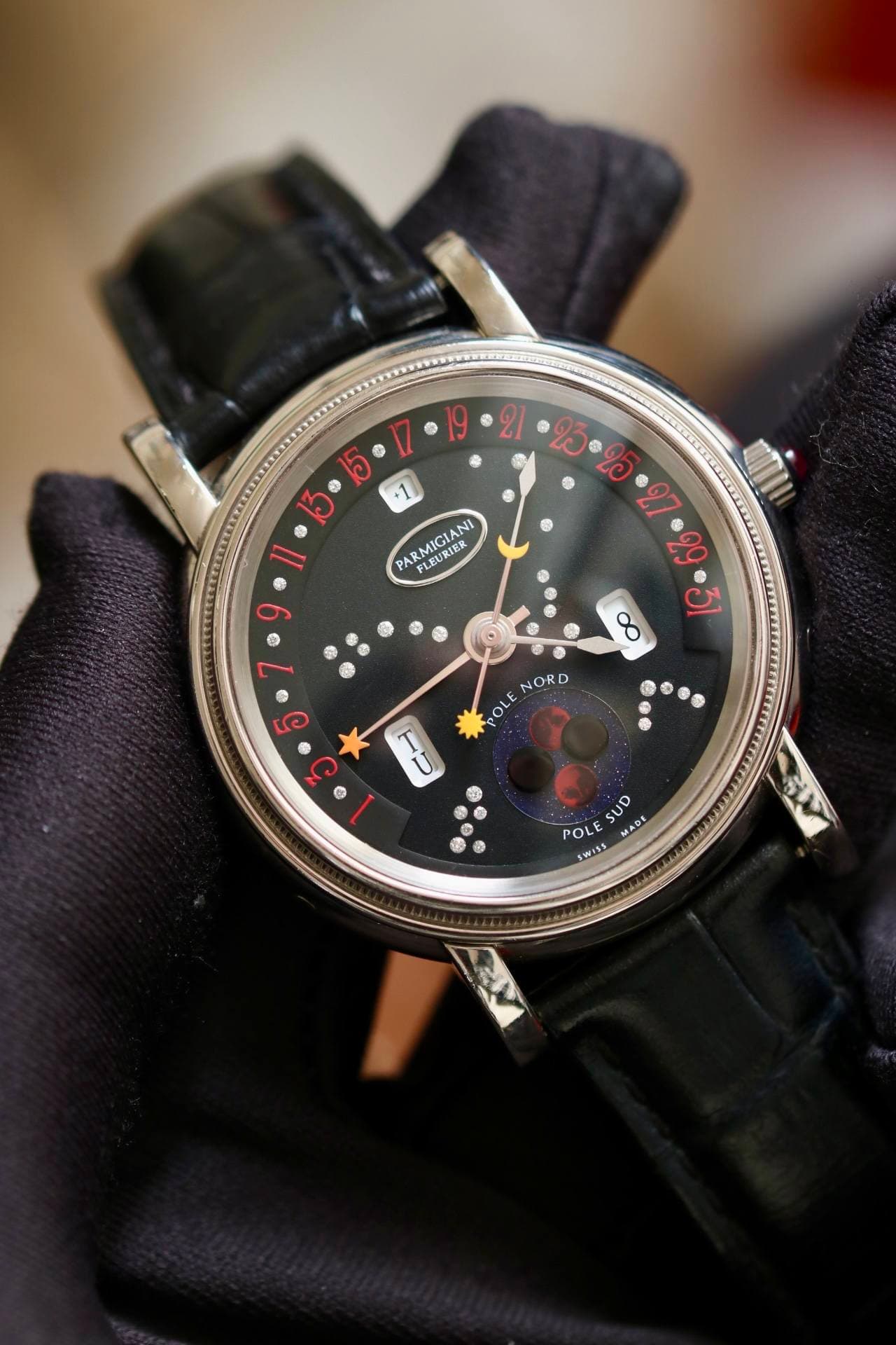 May be an image of wrist watch and text that says '21 5 ® 95 ใอ +1 PARMIGIANI FLEUR FLEURIE 20 8 & NORD OLE POLE 發 © G 9 防 POLE SUD MADE MADE $Wち SL'