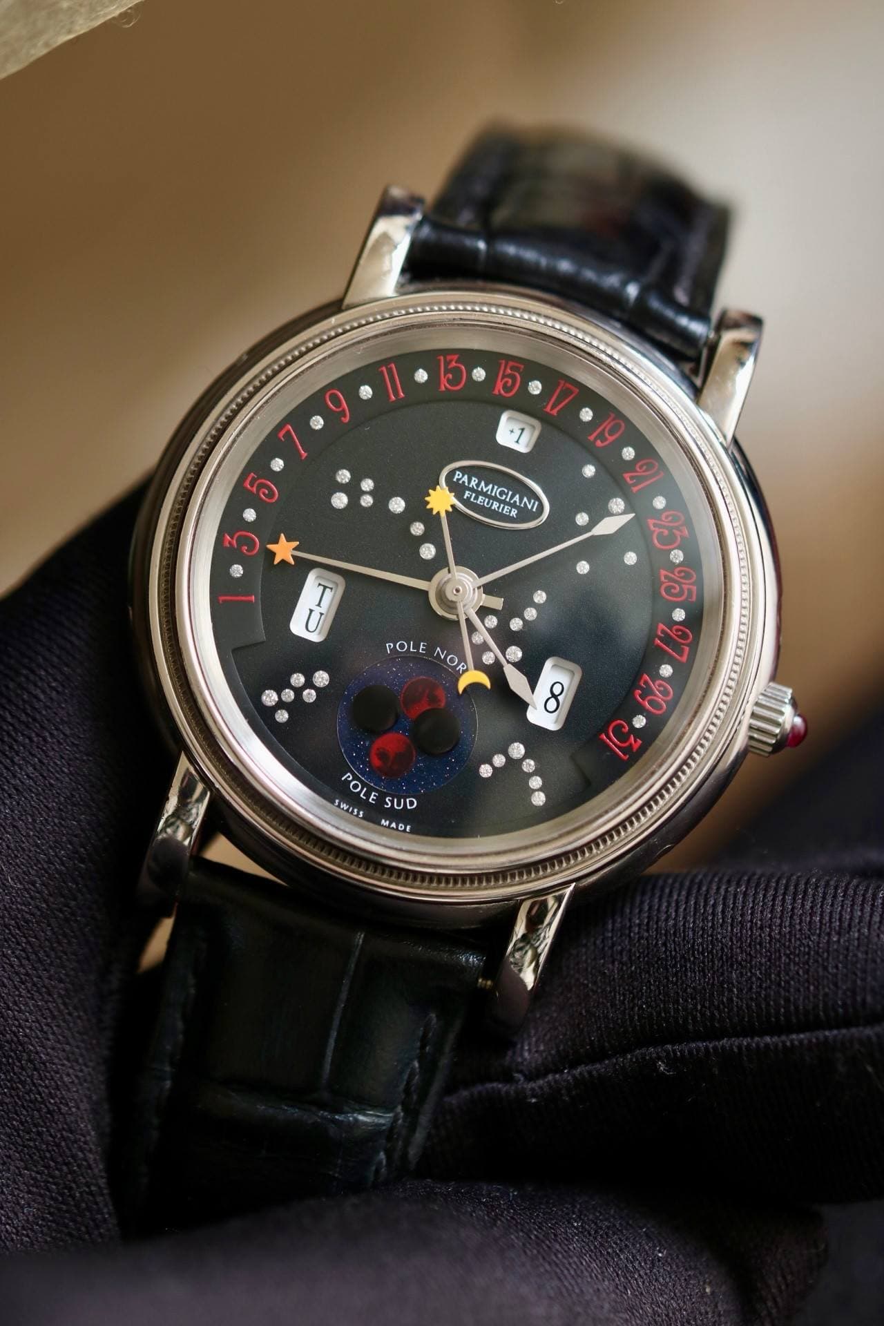 May be an image of wrist watch and text that says '13 อ ® +1 ම う ၇ု ΡΑ LEURIER PARMIGIANI NI .630ረ6.06 E5 U ® 像 POLE NOR 9 POLE POL sWISS SUD MADE'