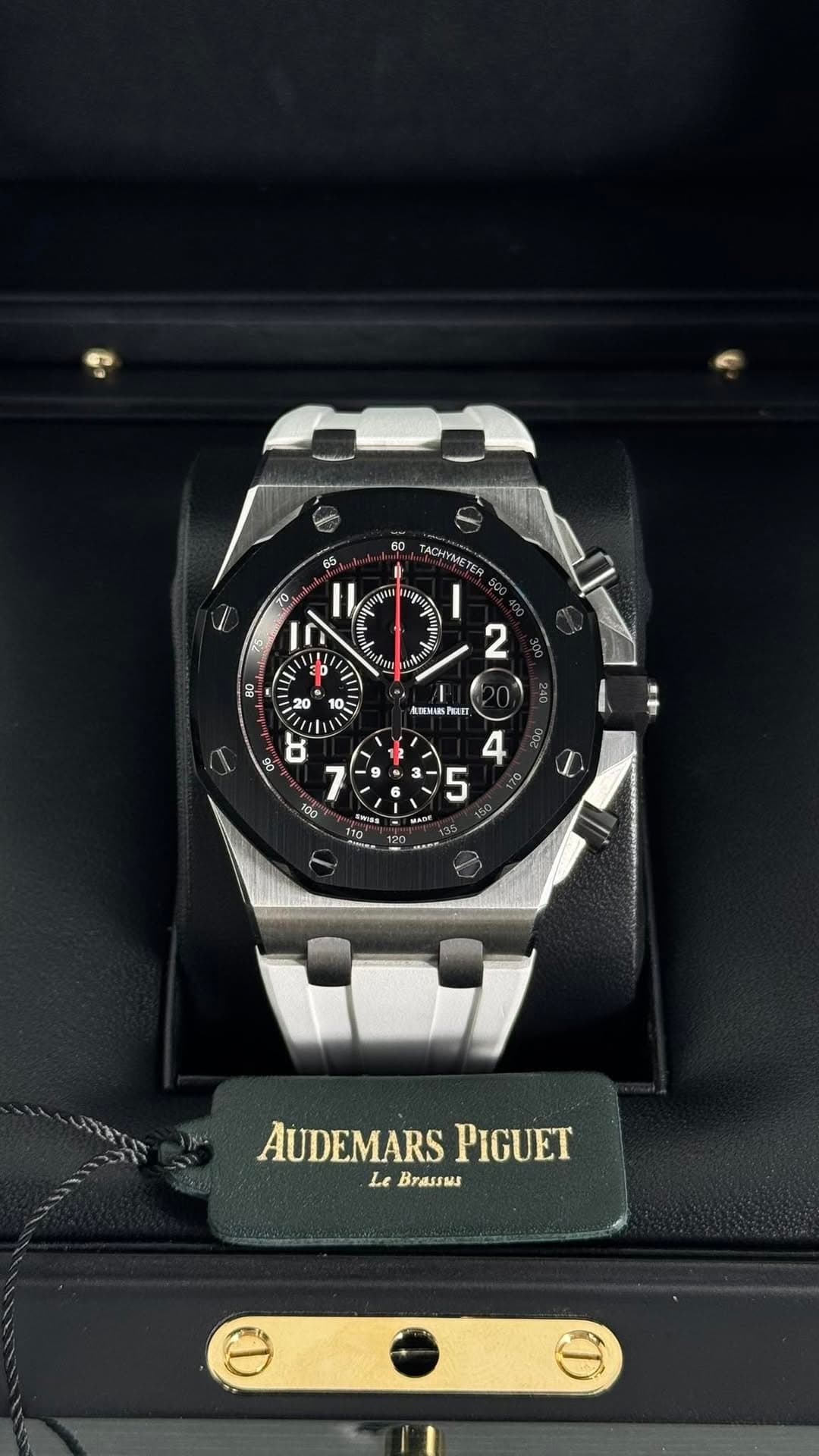 May be an image of wrist watch and text