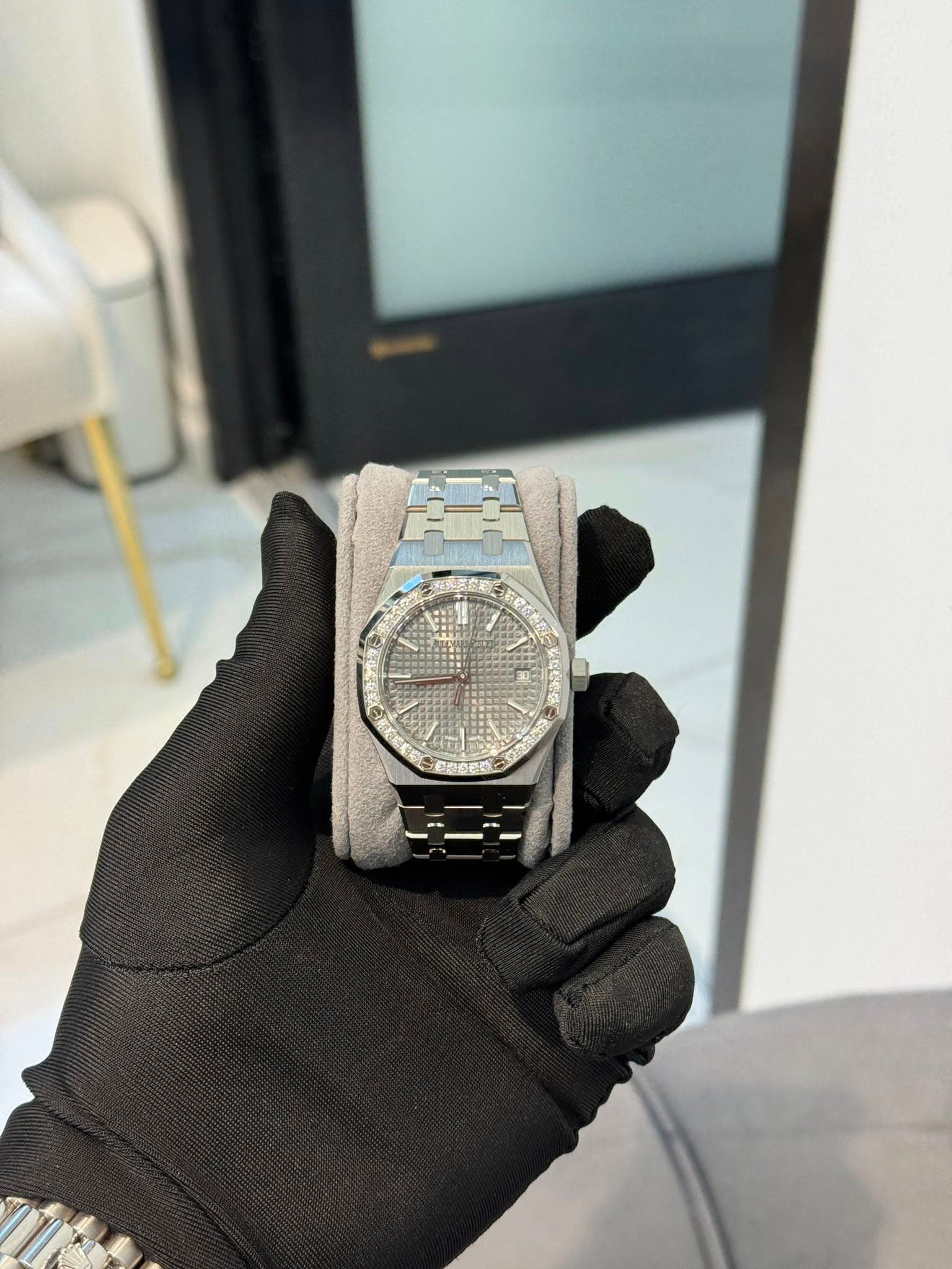 May be an image of wrist watch and text