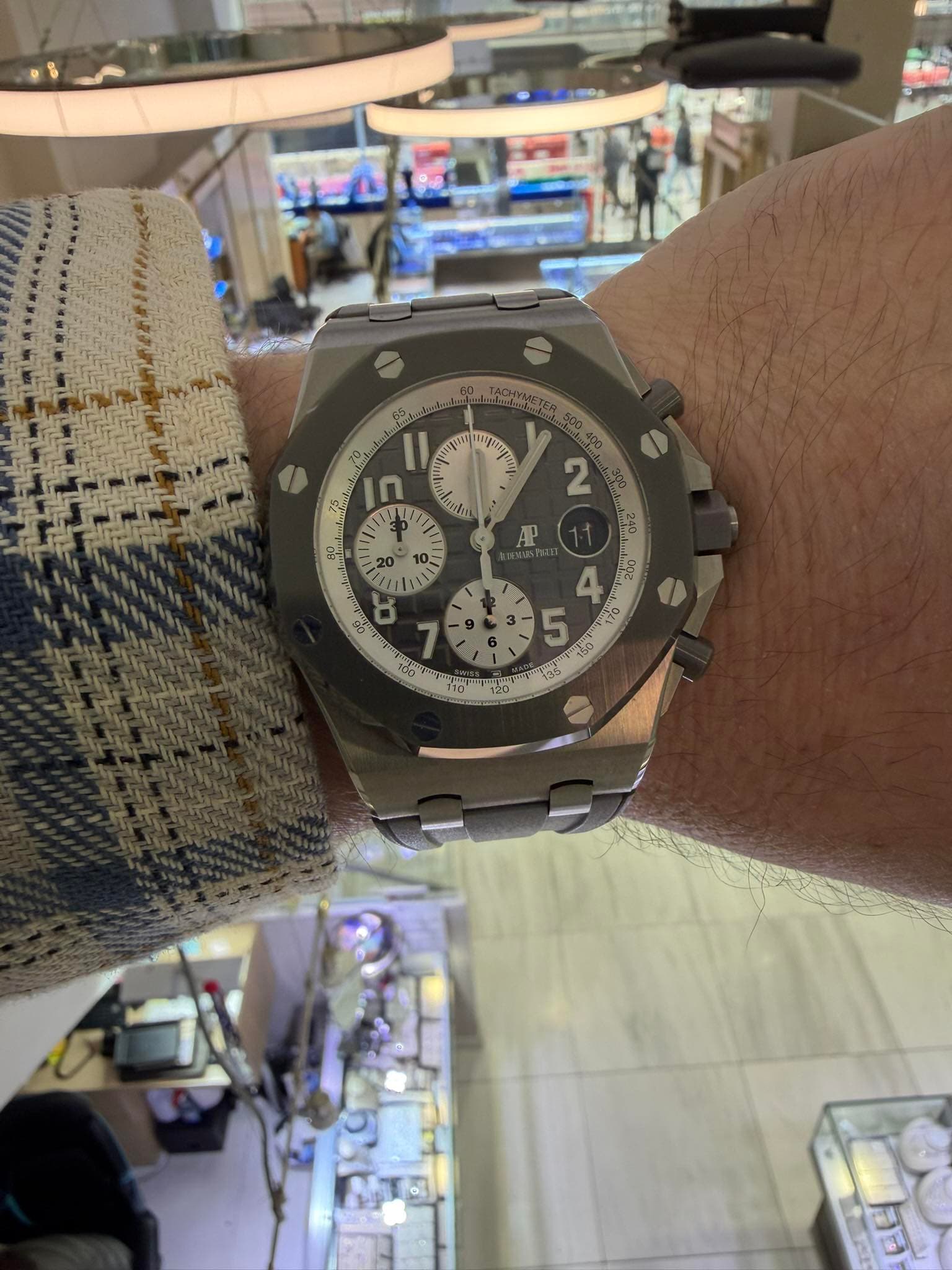 May be an image of wrist watch and text