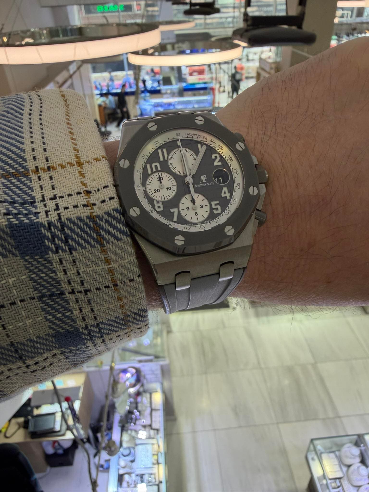 May be an image of wrist watch and text