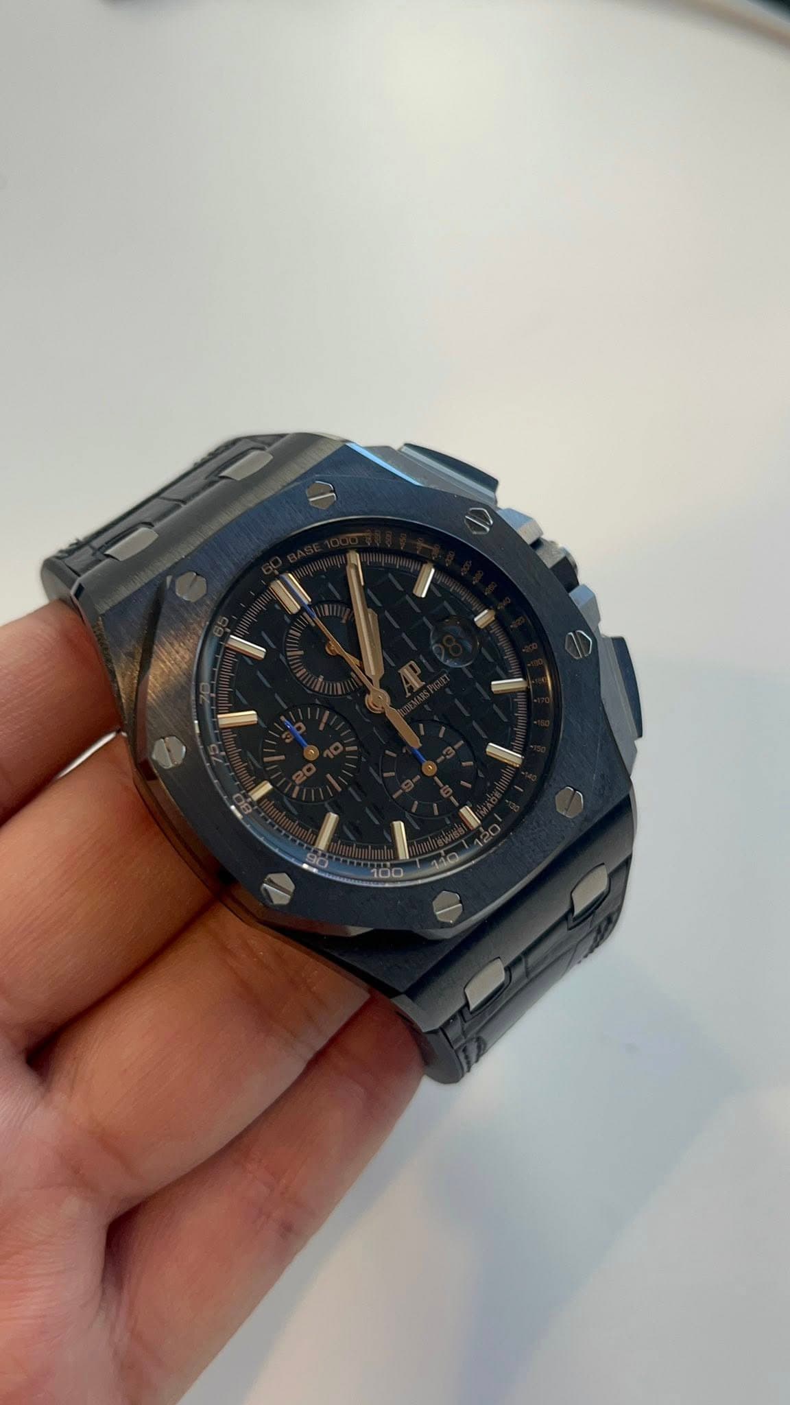 May be an image of digital watch and text