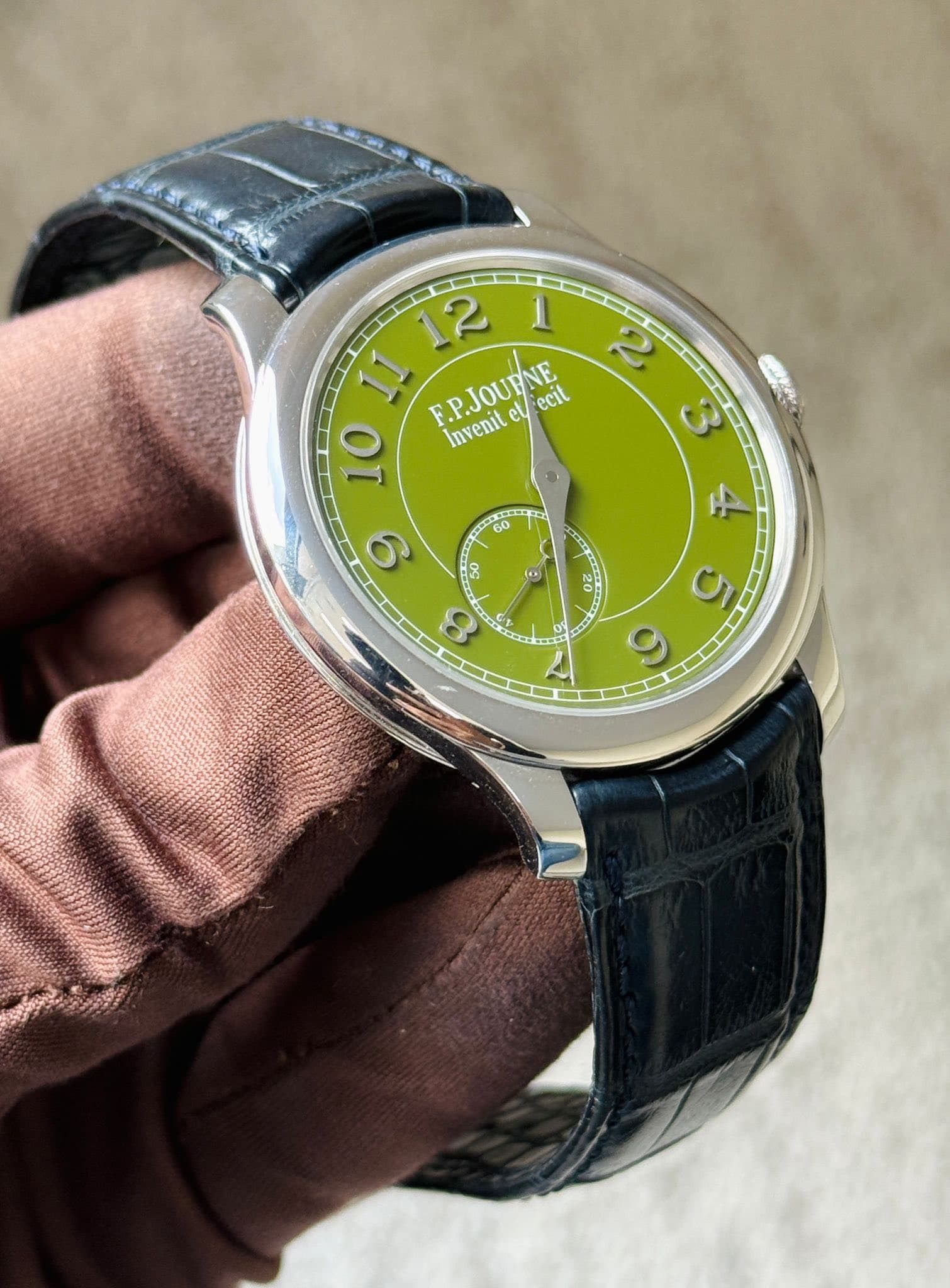 May be an image of wrist watch and text