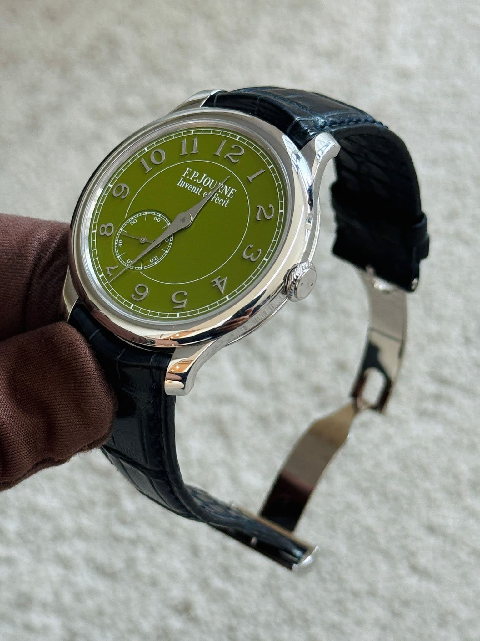 May be an image of wrist watch and text that says ' Invenil F.P.Jou E.PJOURNE Fe RNE e fecil 8 40 Lo o 0 10 7 ב E ቸ 9 5'