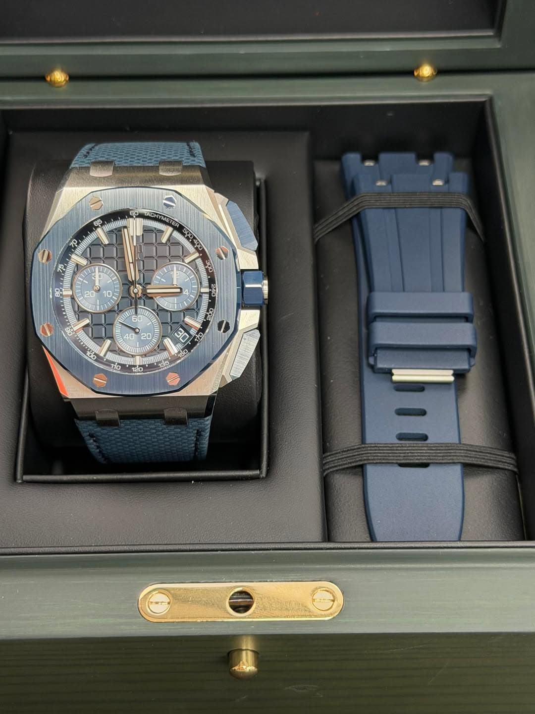May be an image of wrist watch and text