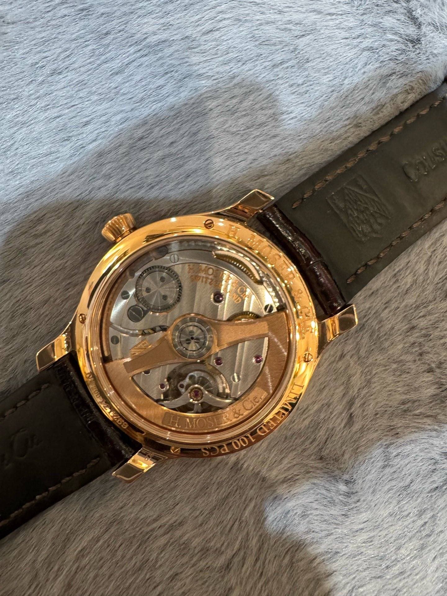 May be an image of wrist watch and text