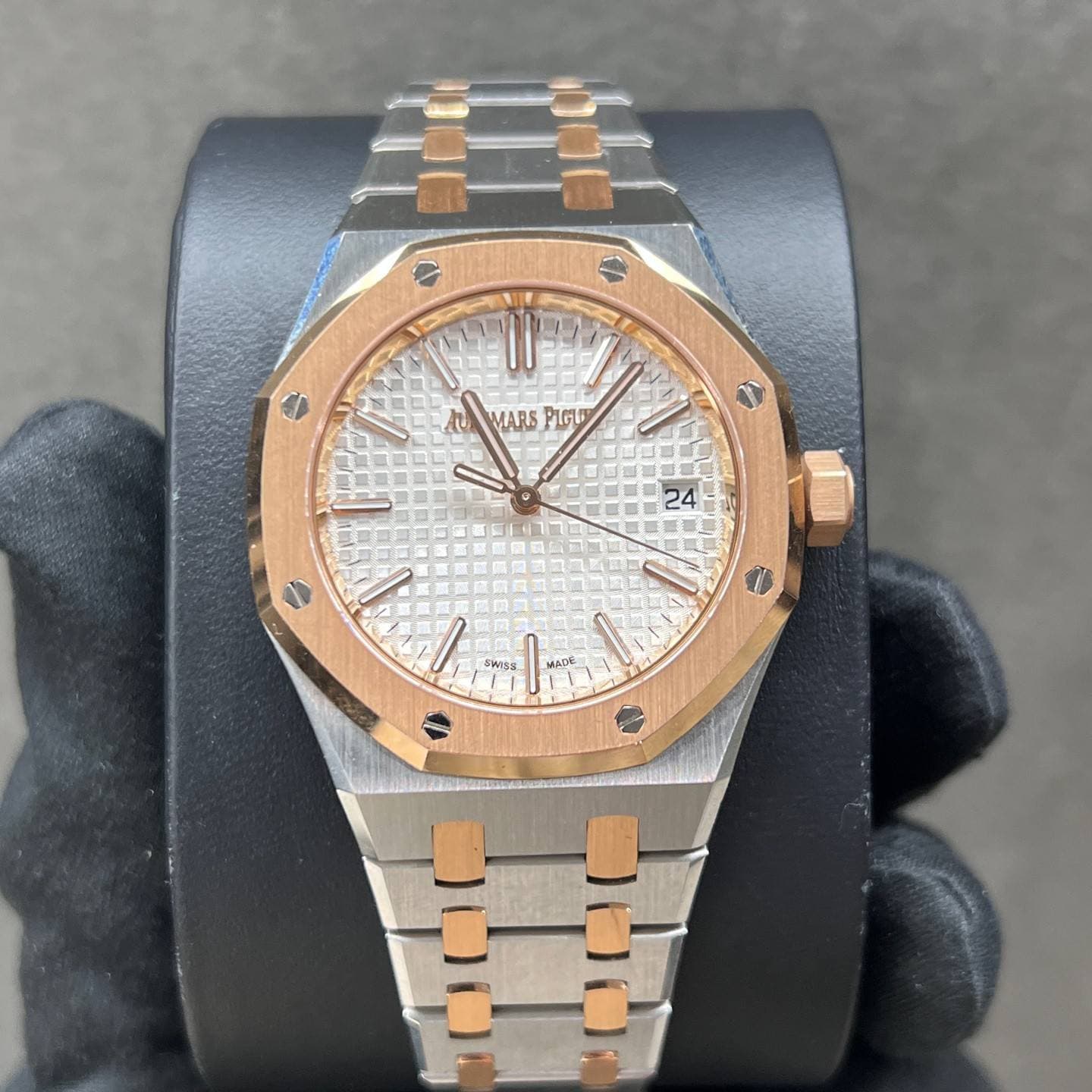 May be an image of wrist watch and text that says 'ት - s T Nu MARS የ 24 TK a 0 ۱ SWISS MS'