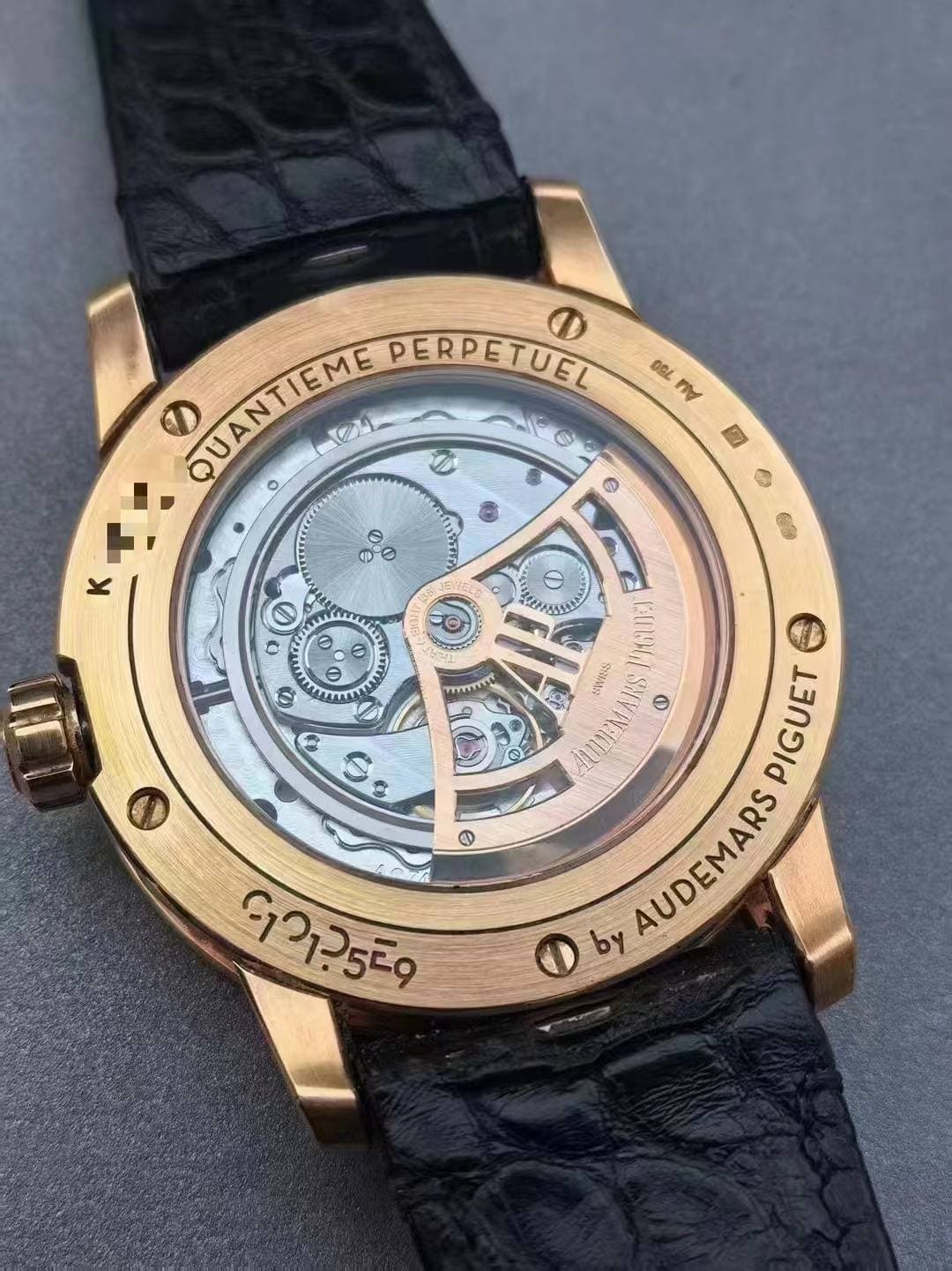 May be an image of wrist watch and text