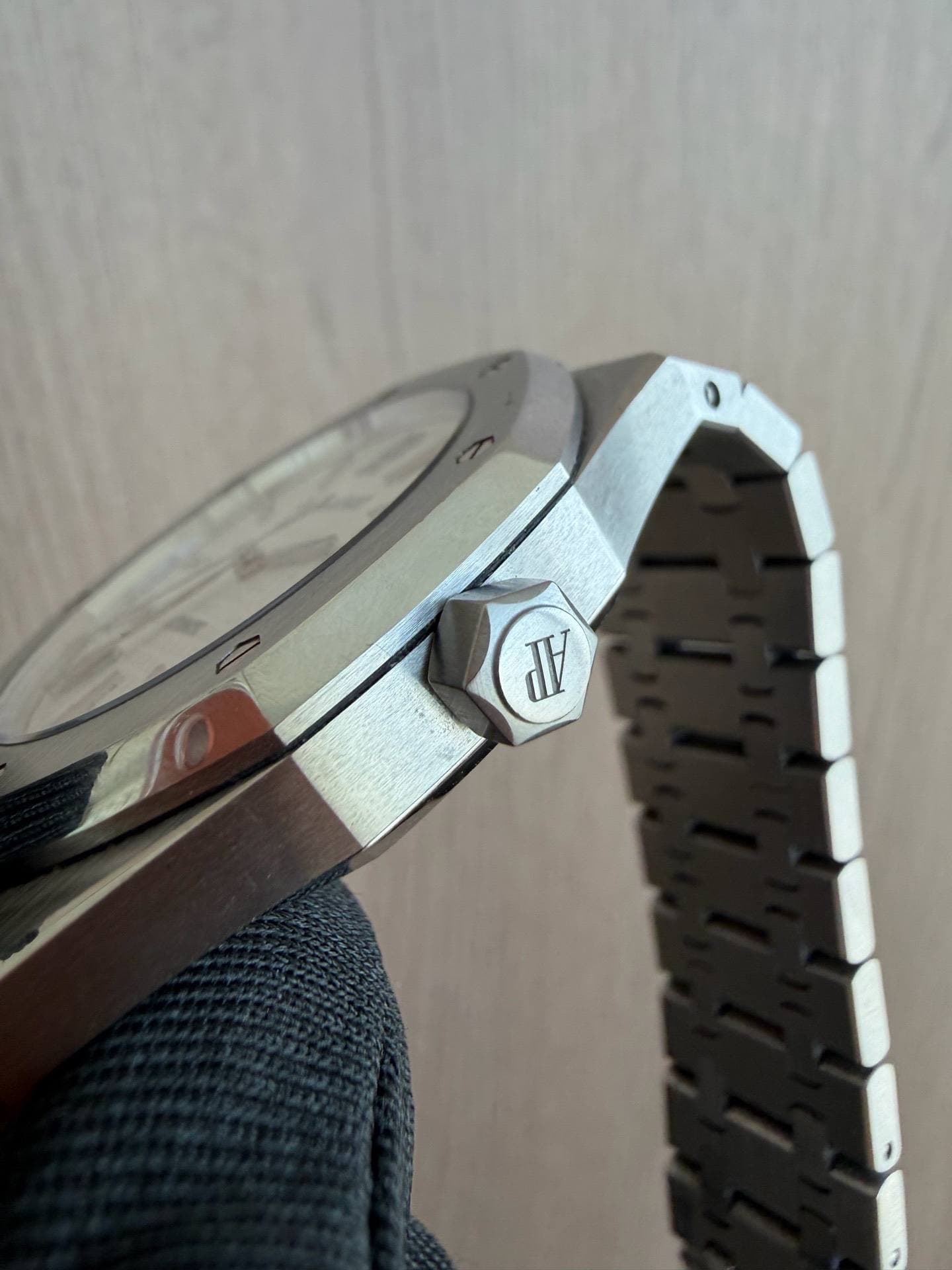 May be an image of wrist watch and text