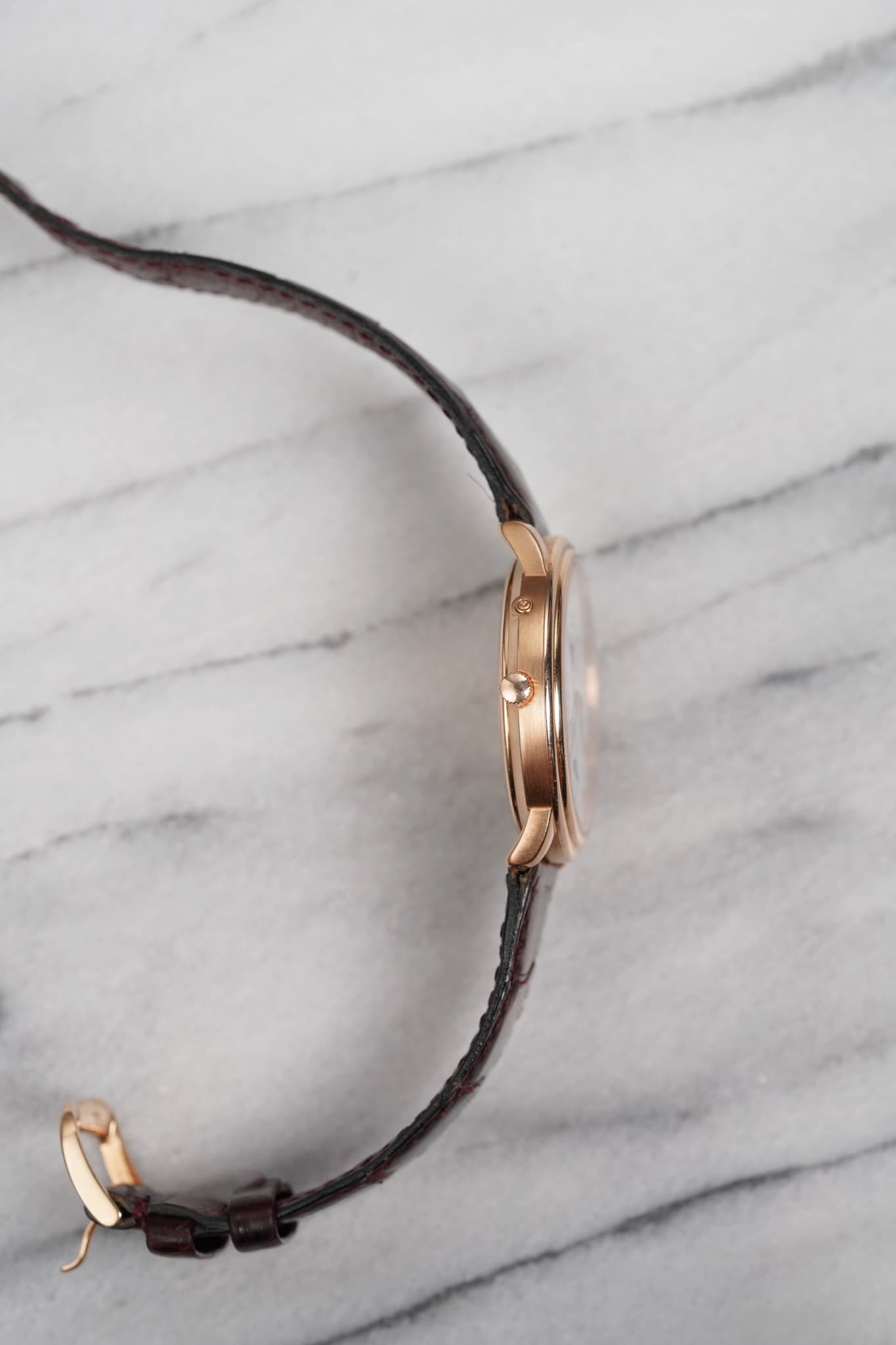 May be an image of leather, jewelry and wrist watch