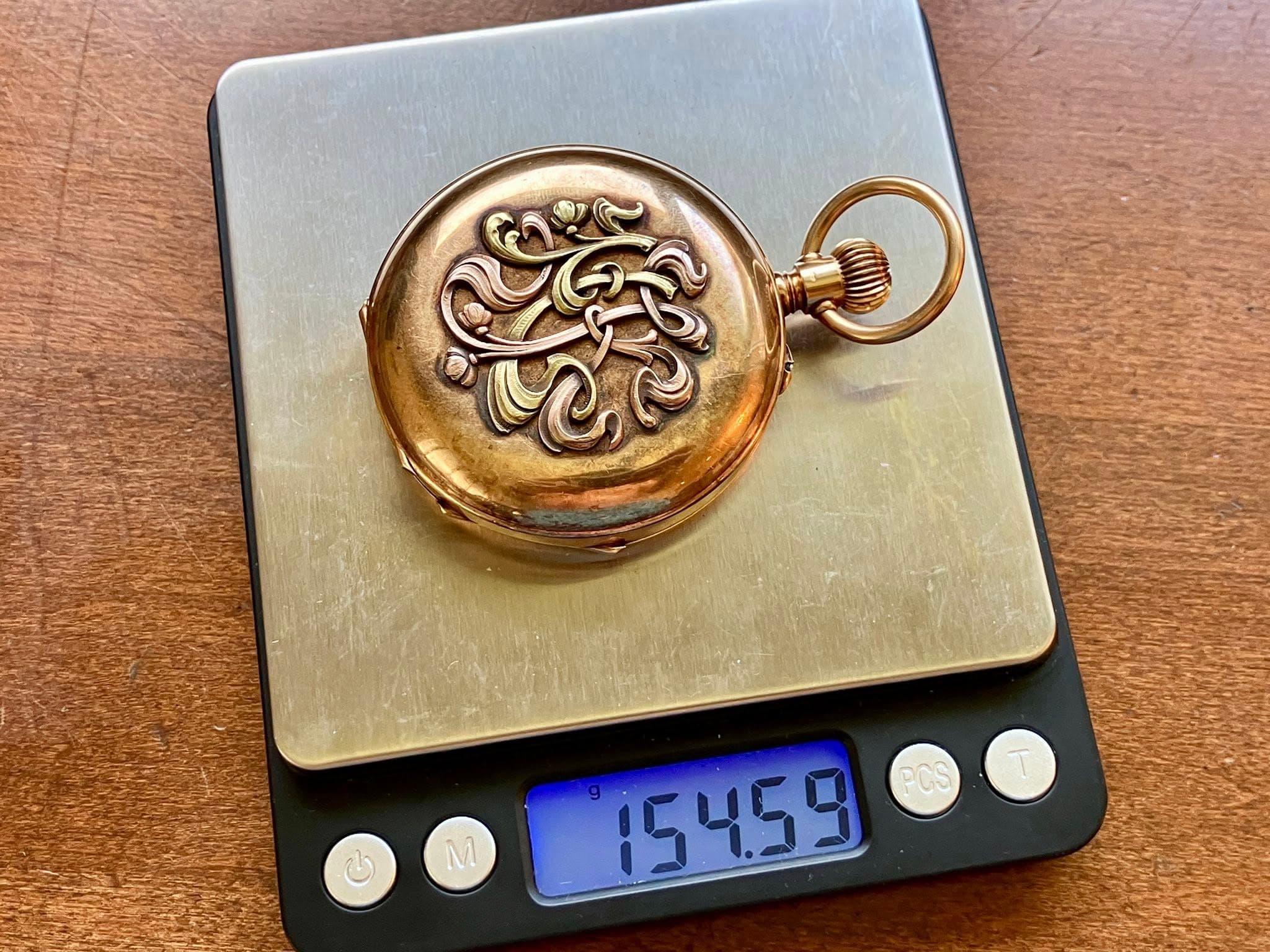 May be an image of brass, wrist watch and text that says 'M 154.59 PCS'