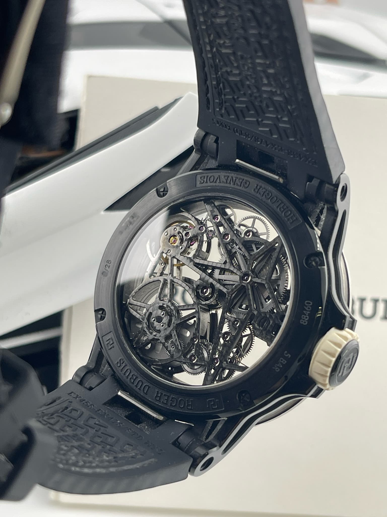 May be an image of wrist watch and text