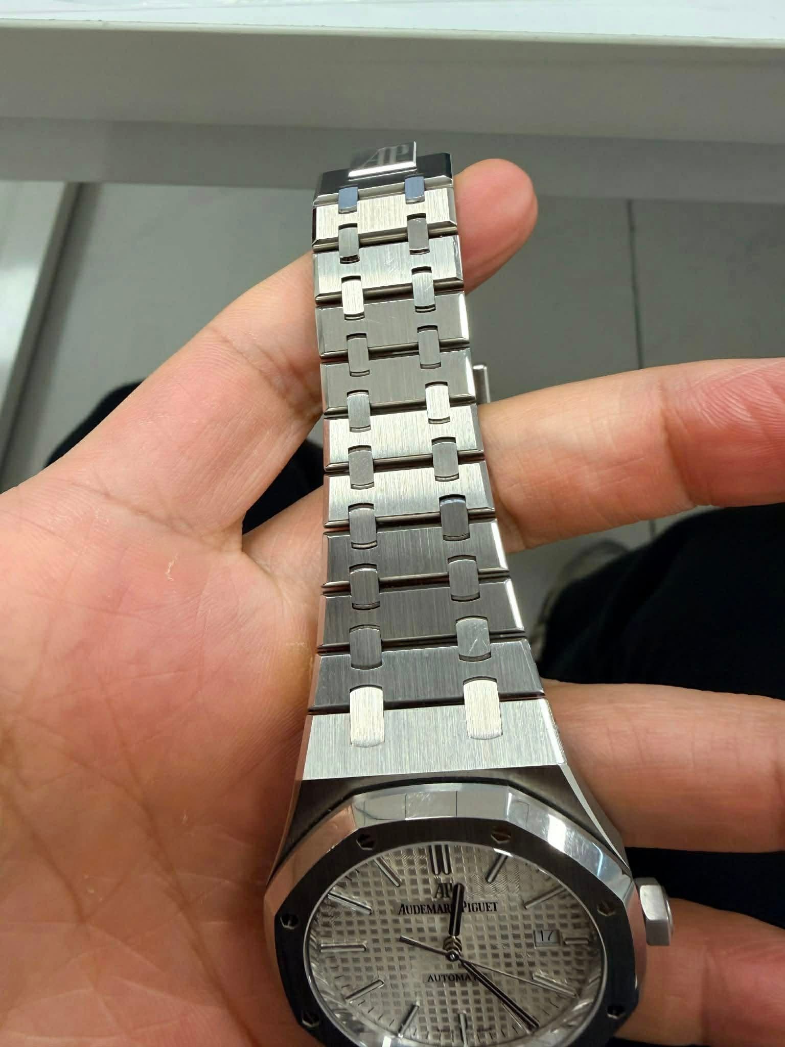 May be an image of wrist watch