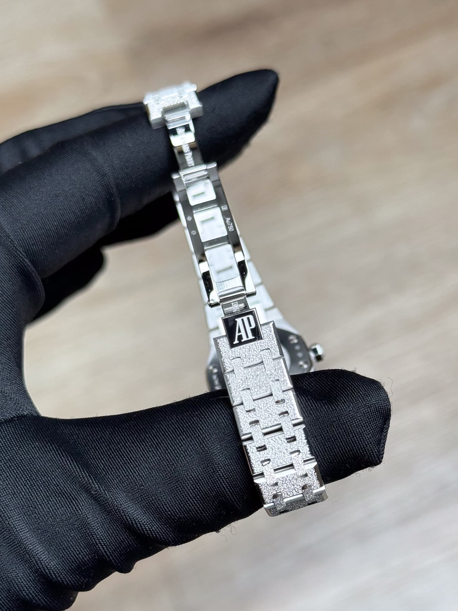 May be an image of jewelry, wrist watch and text that says '2 s750 AP'