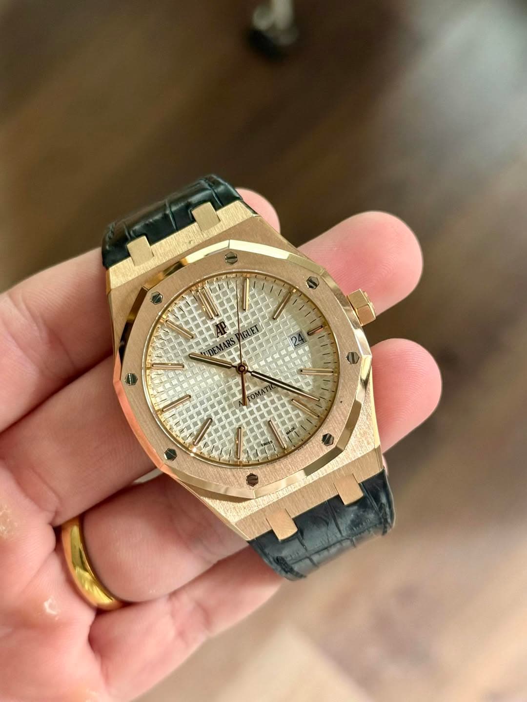 May be an image of wrist watch and text